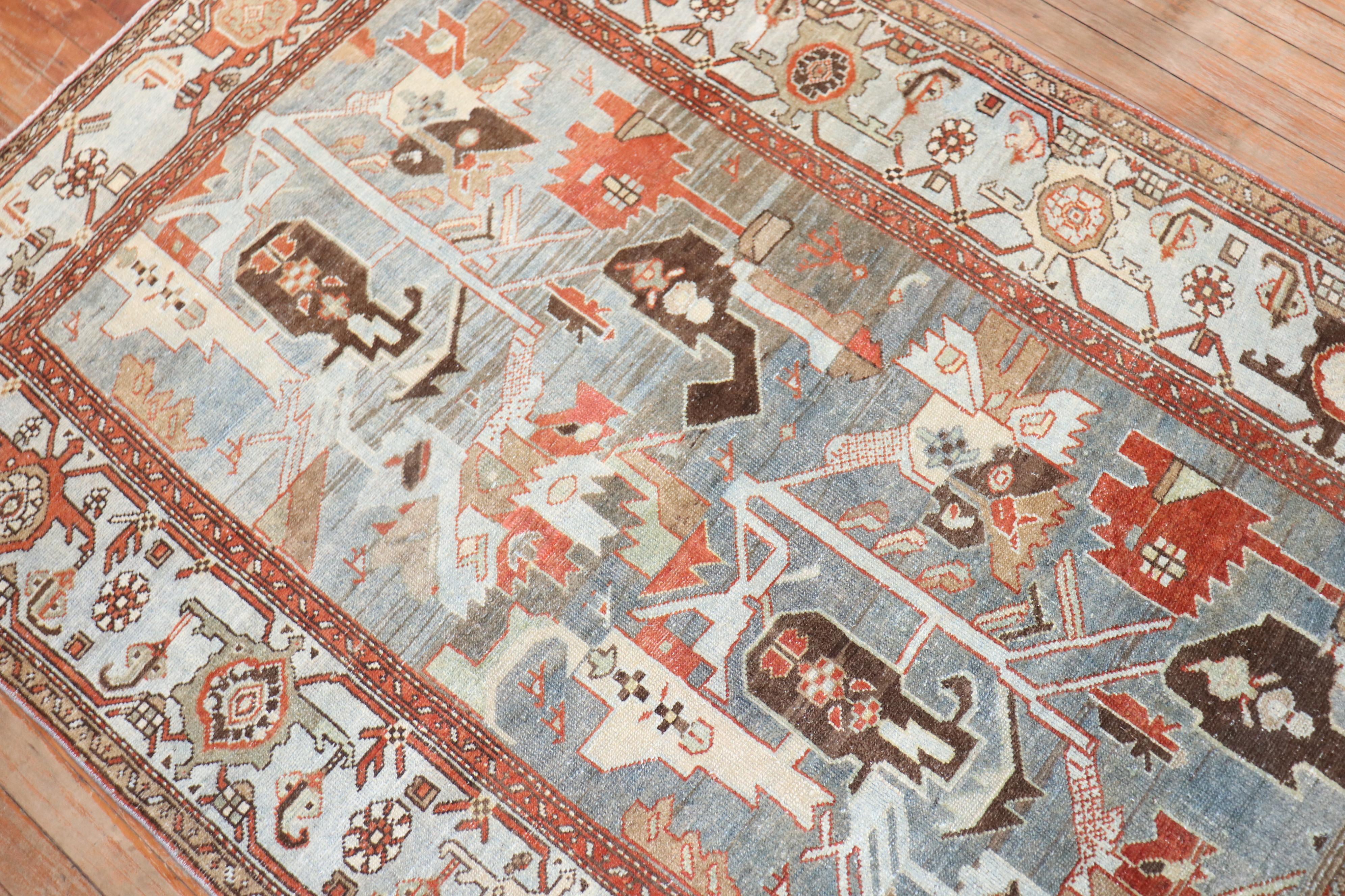 A large accent size early 20th century Persian Malayer rug featuring an abstract pattern

Measures: 4'1