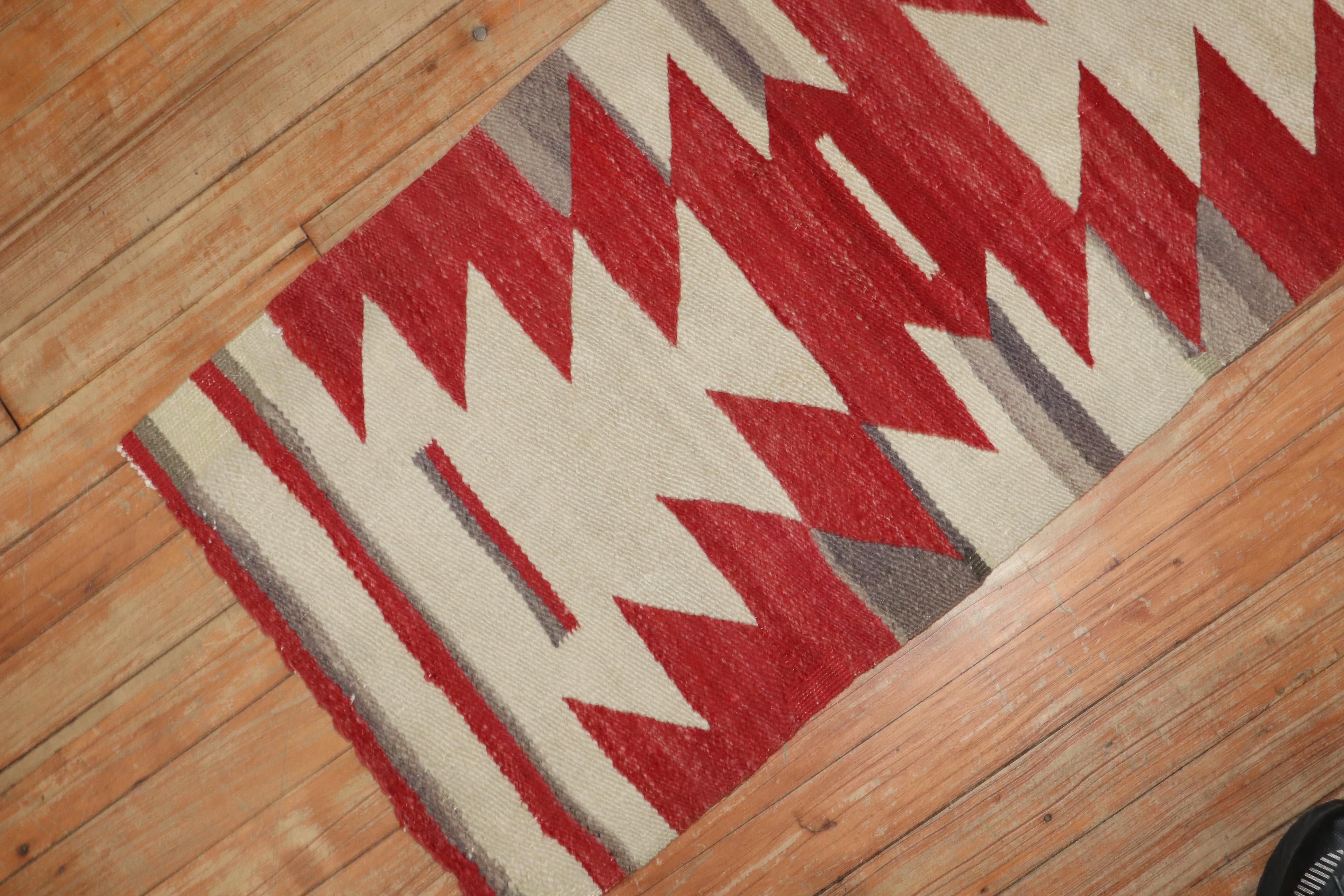 un tapis de couverture Navajo américain du début du 20e siècle

Détails
rug no.	r5834
taille	1' 4
