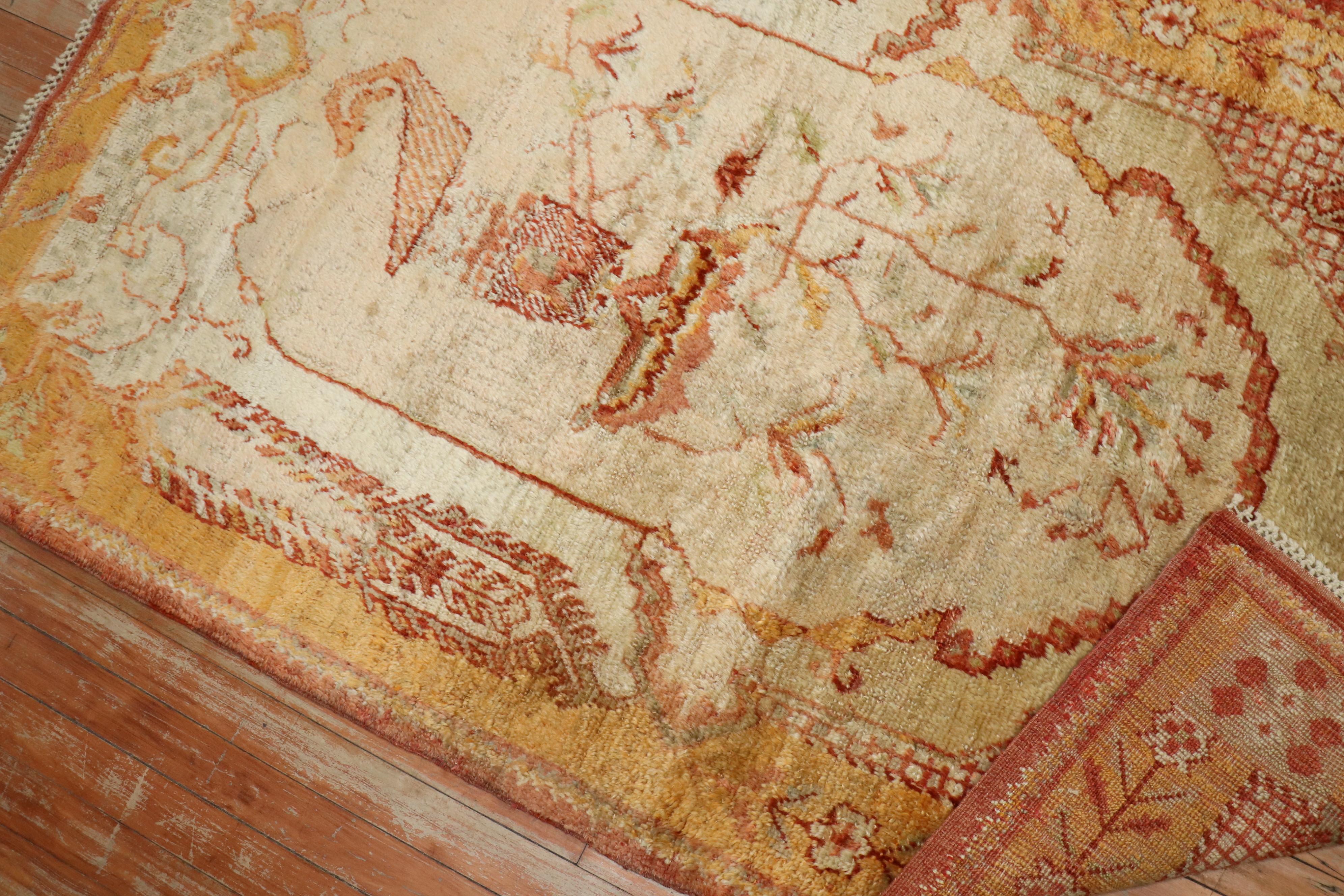 A Late 19th Century Angora wool Turkish Oushak rug

Details
rug no.	j3645
size	3' 8
