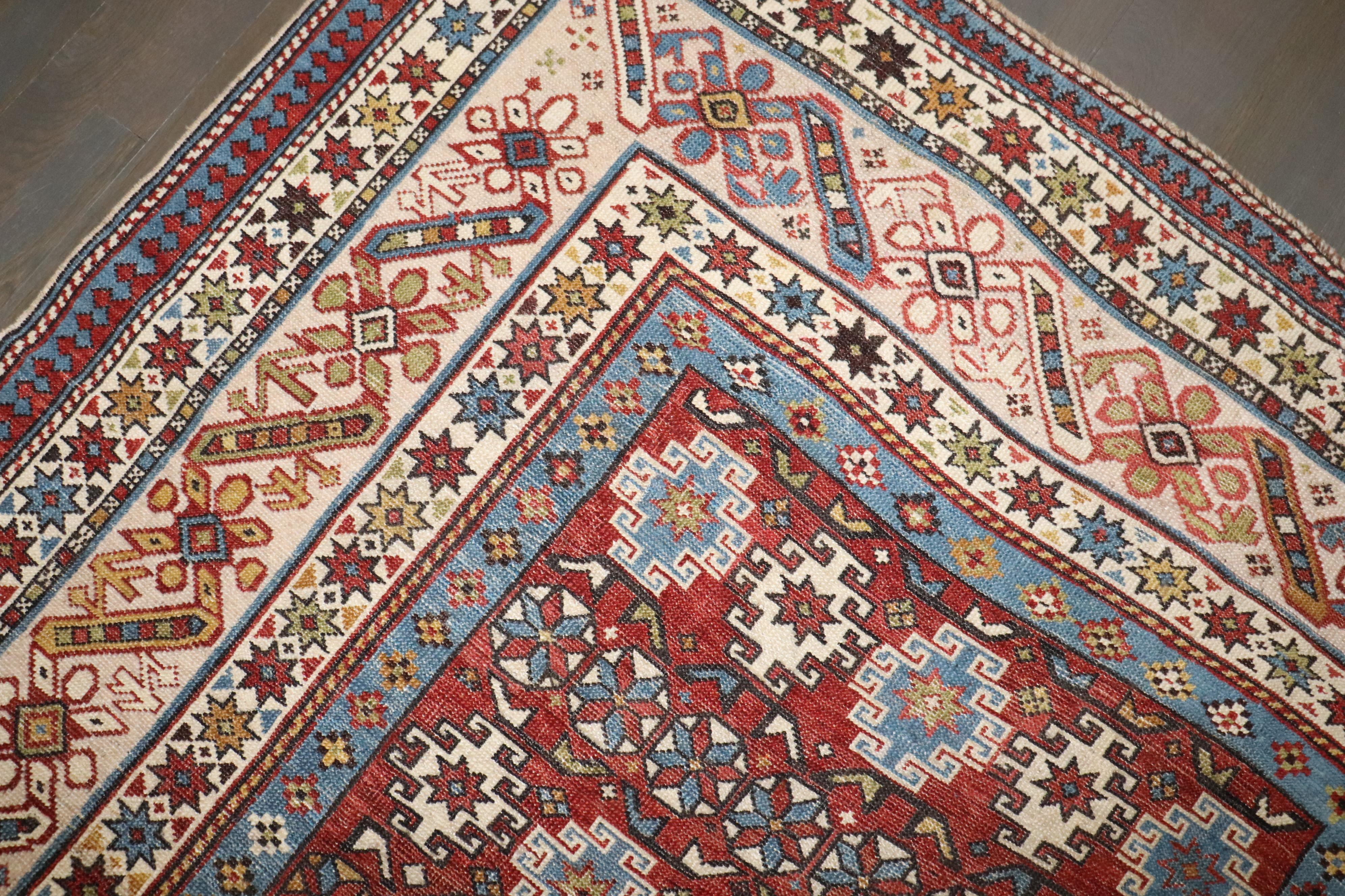 a late 19th century intermediate size caucasian chi chi pattern rug

Details
rug no.	j4028
size	4' 10