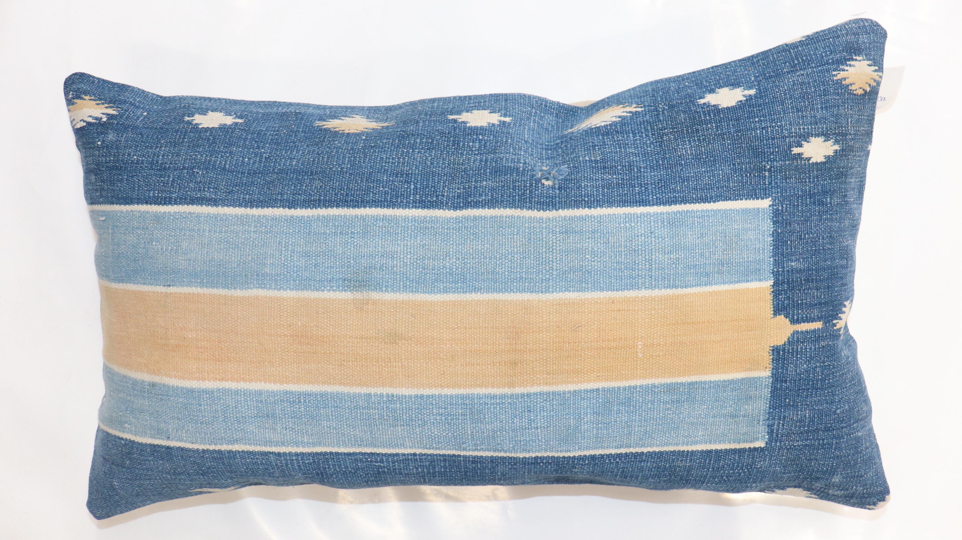 Pillow made from an early 20th century Indian Jail Dhurrie Flat-woven Rug

Measures: 12' x 21''.