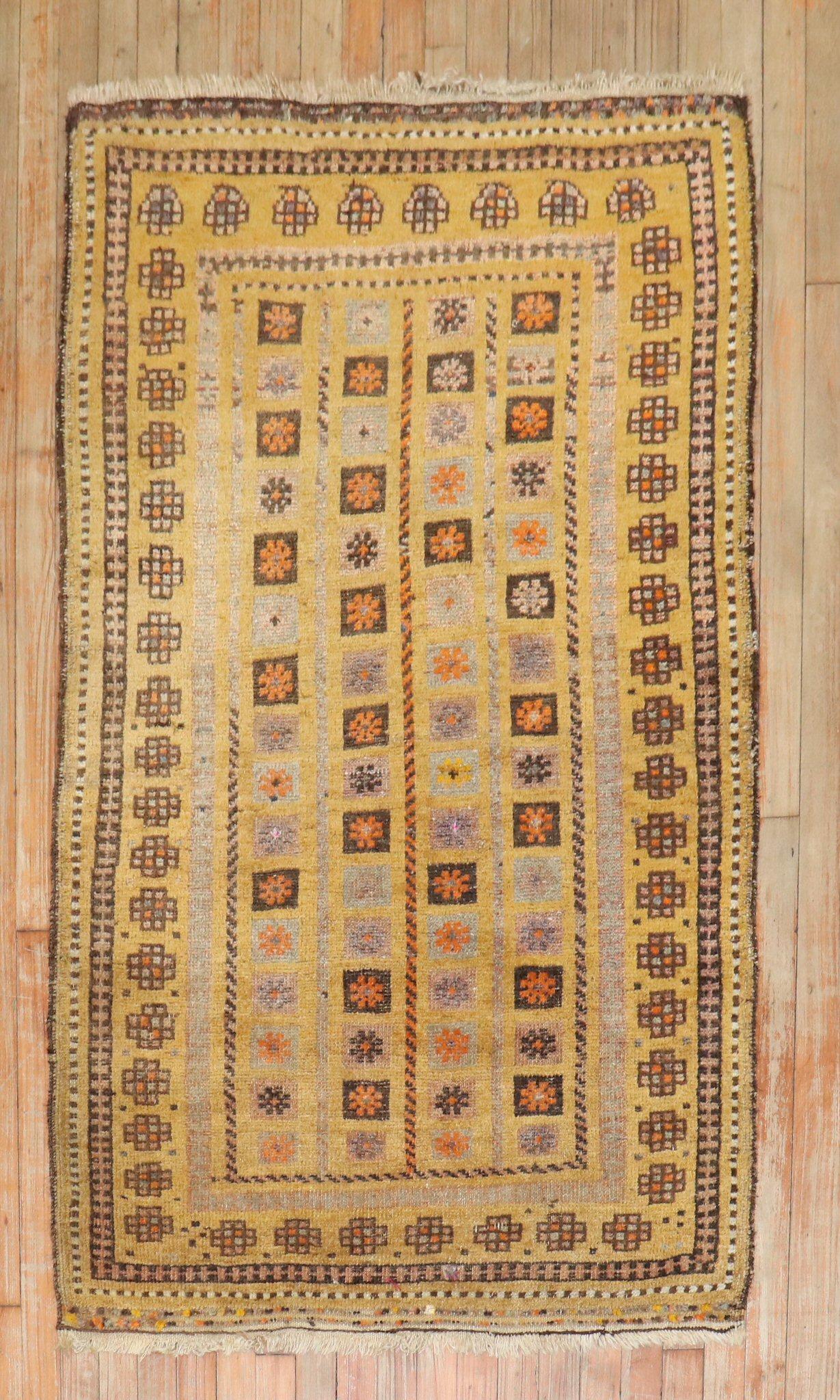 An early 20th Mustard Color Antique Baluch scatter size rug

3'3'' x 5'2''