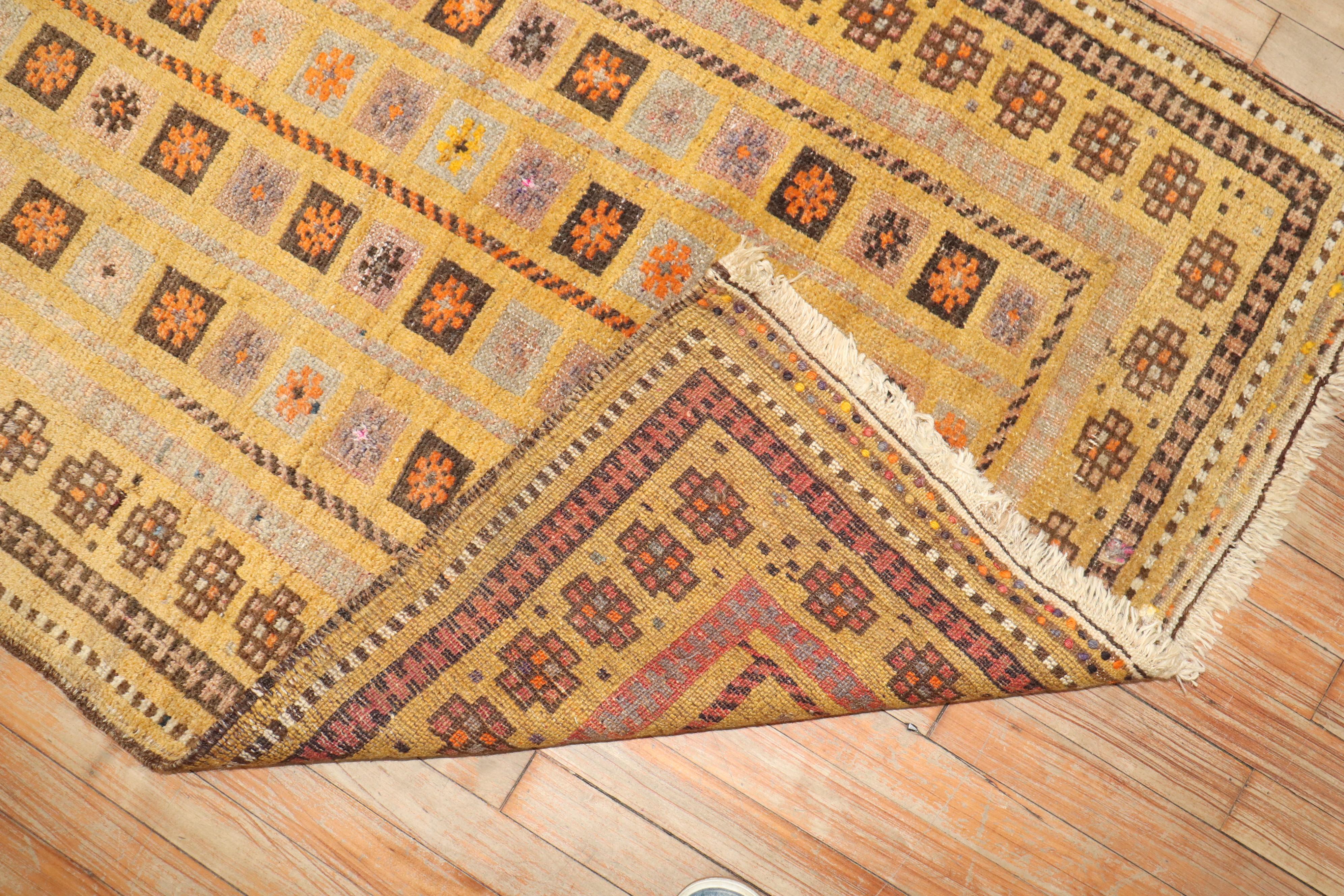 Zabihi Collection Antique Mustard Color Baluch Rug In Good Condition For Sale In New York, NY
