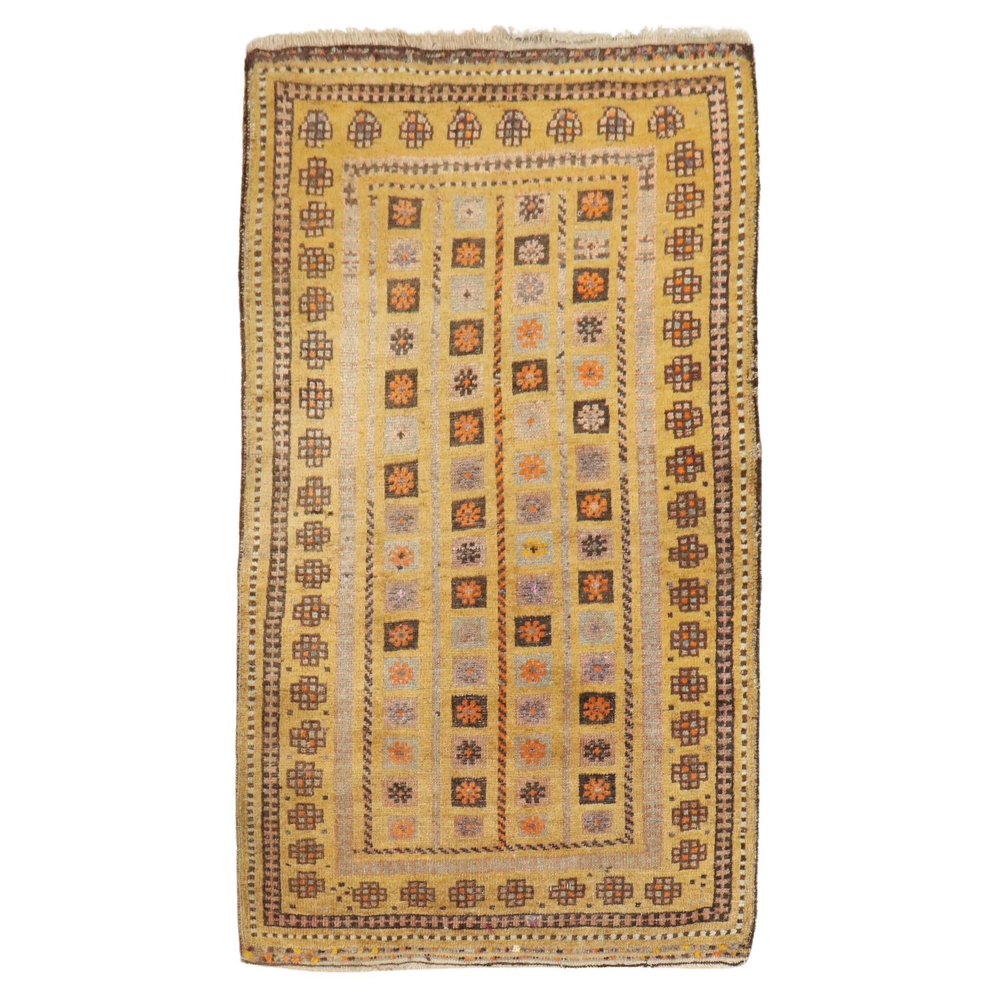 Zabihi Collection Antique Mustard Color Baluch Rug For Sale