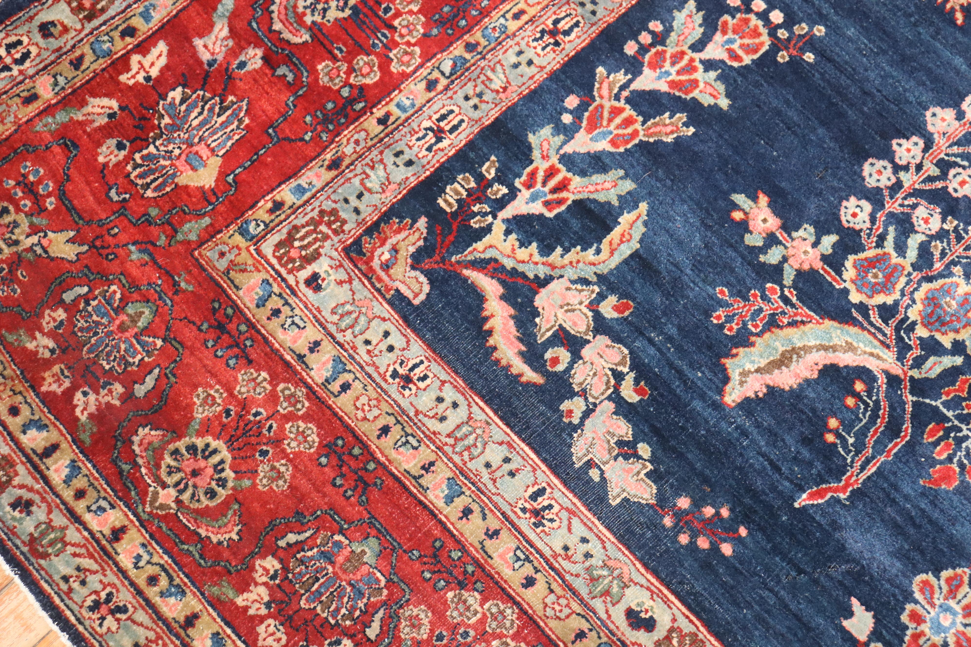 An authentic early 20th-century room size Persian Mohajeran  Sarouk carpet in predominantly navy

Measures: 8'9''x 11'11