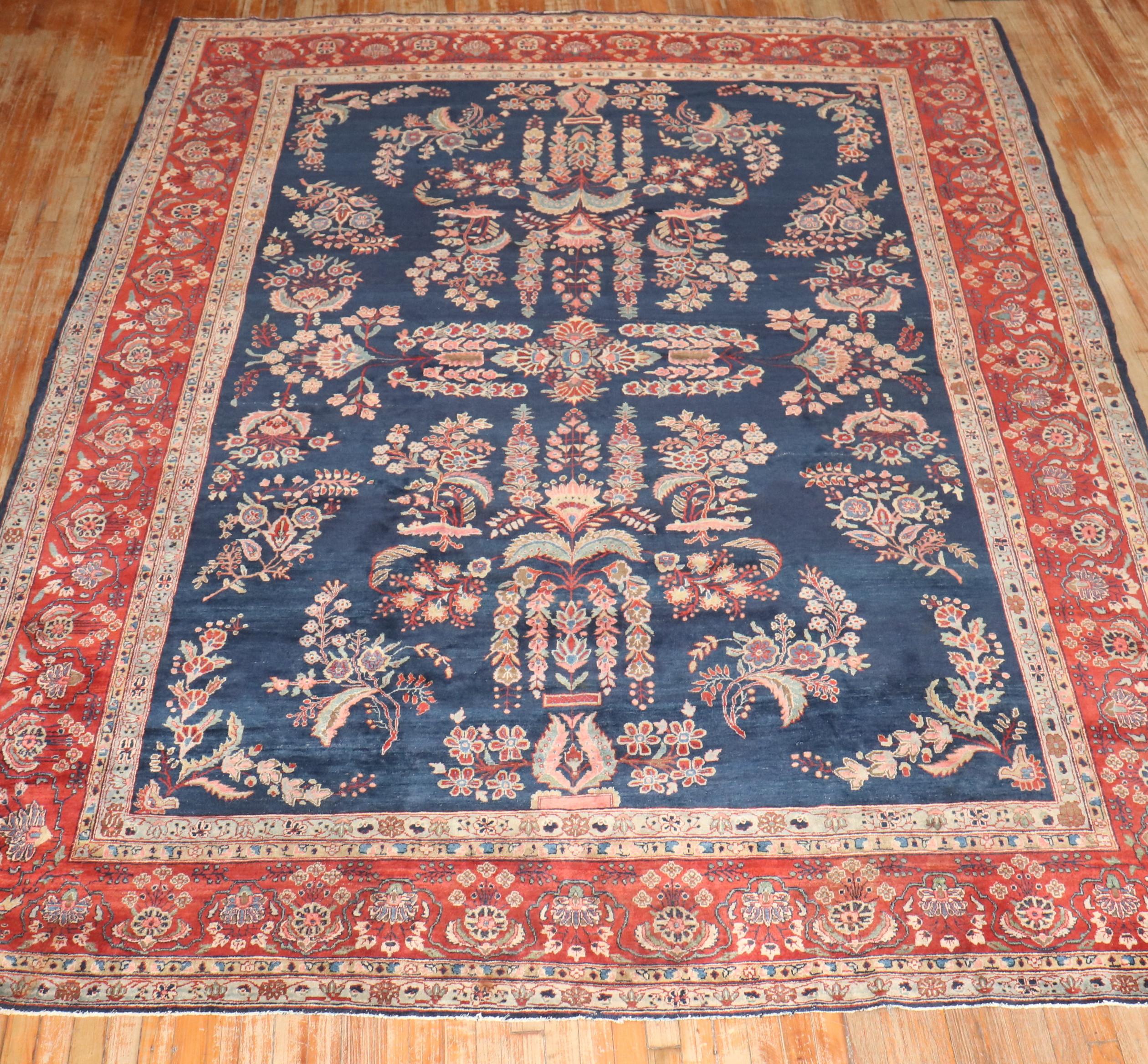 20th Century Zabihi Collection Antique Navy Blue Persian Sarouk Rug For Sale