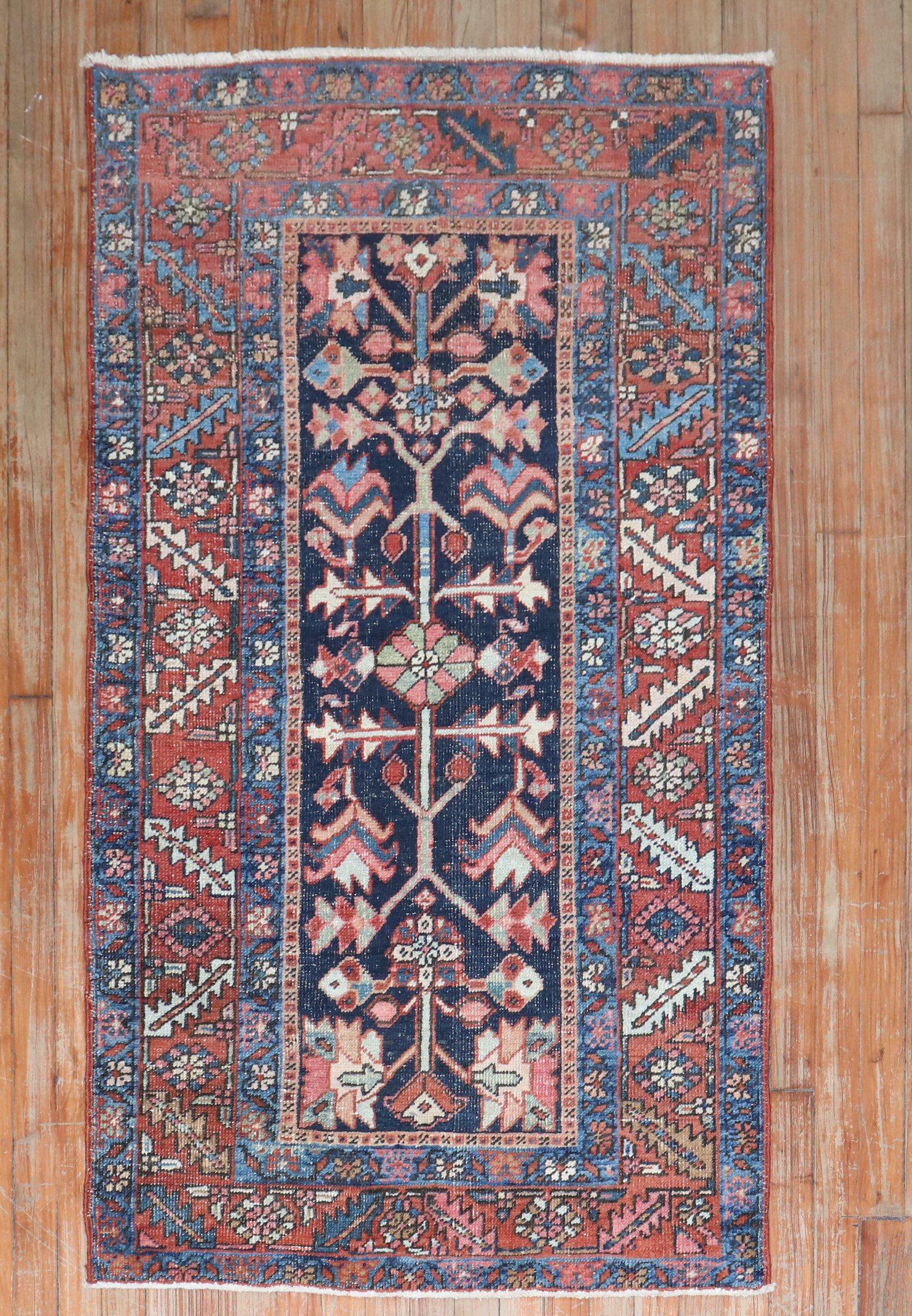 Antique Persian Heriz runner from the 2nd quarter of the 20th century with an all-over geometric motif on a navy blue ground.

2'11'' x 5'3''