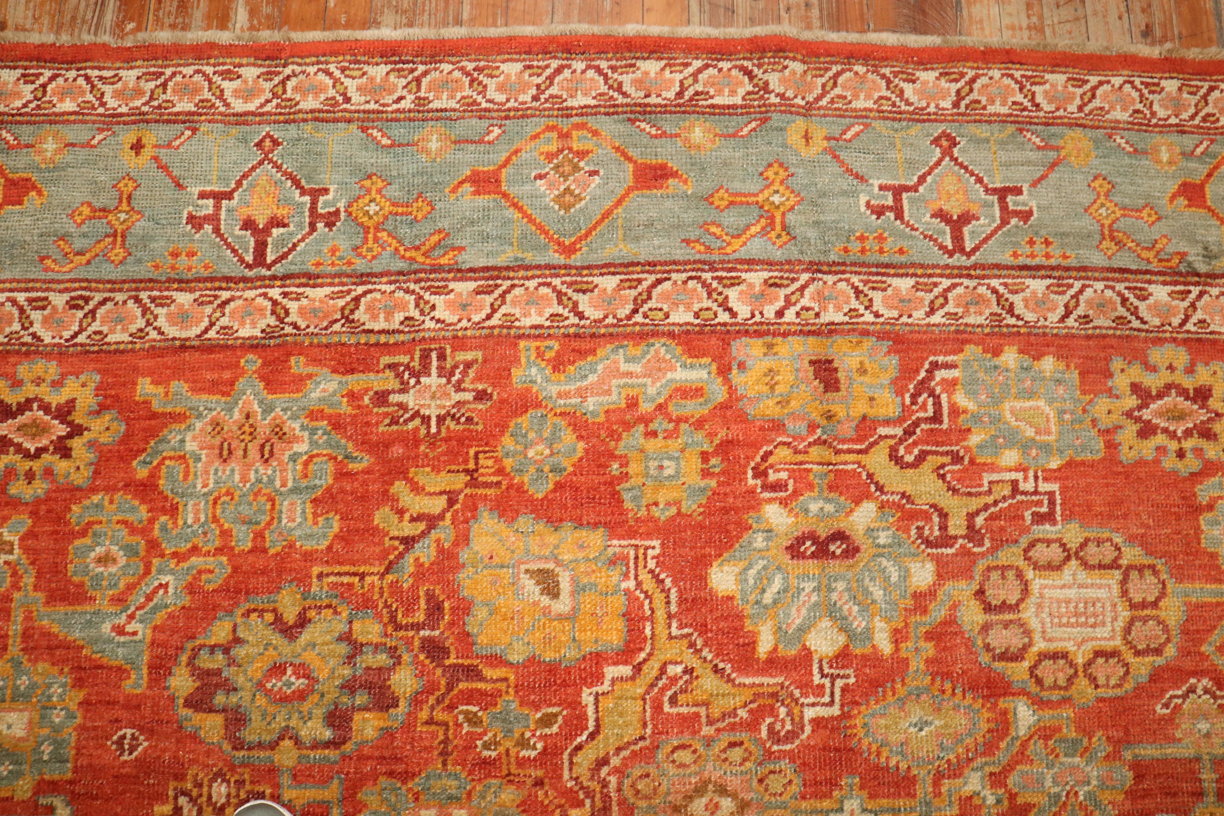 Zabihi Collection Antique Oushak Coral Red Rug In Good Condition For Sale In New York, NY