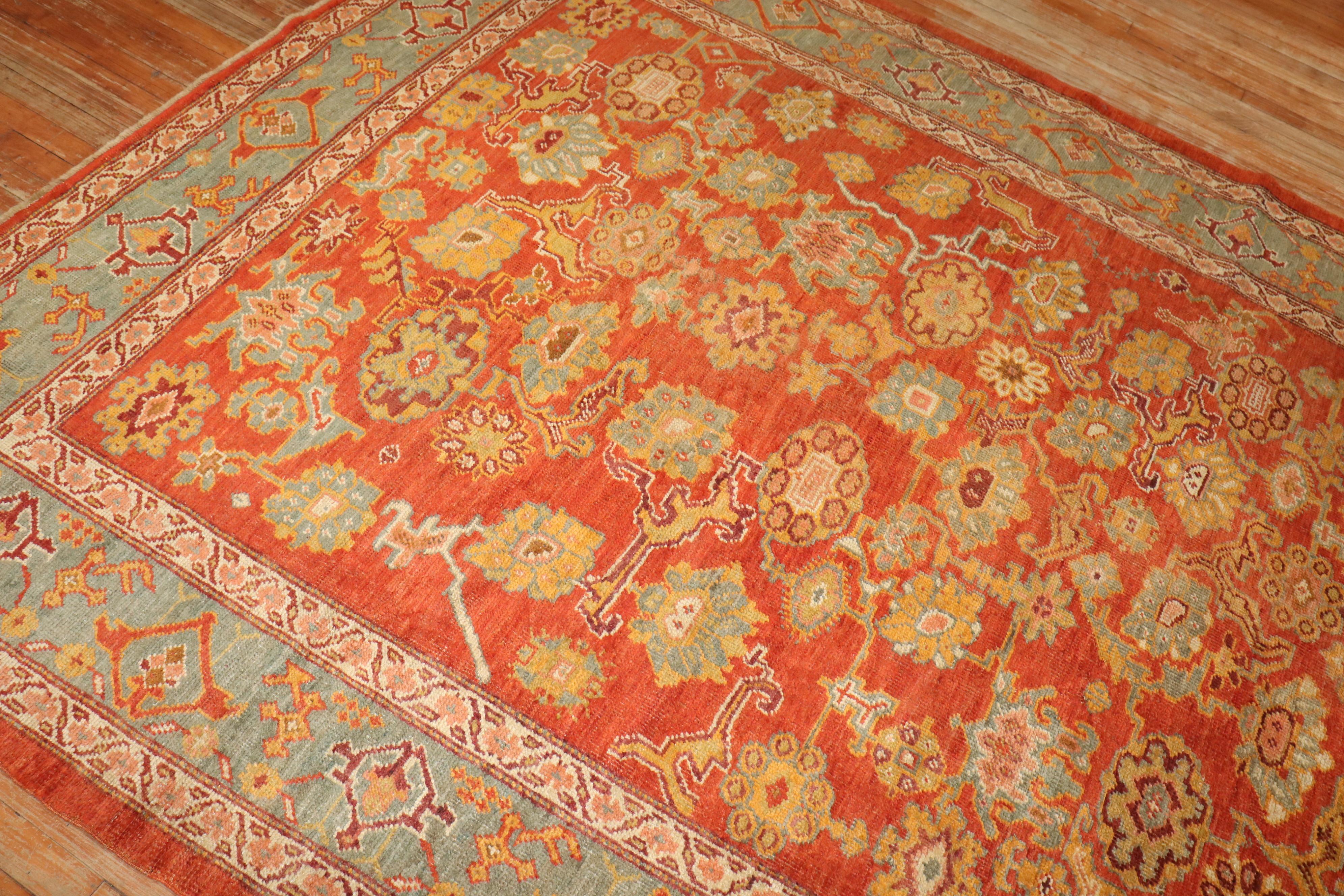 20th Century Zabihi Collection Antique Oushak Coral Red Rug For Sale
