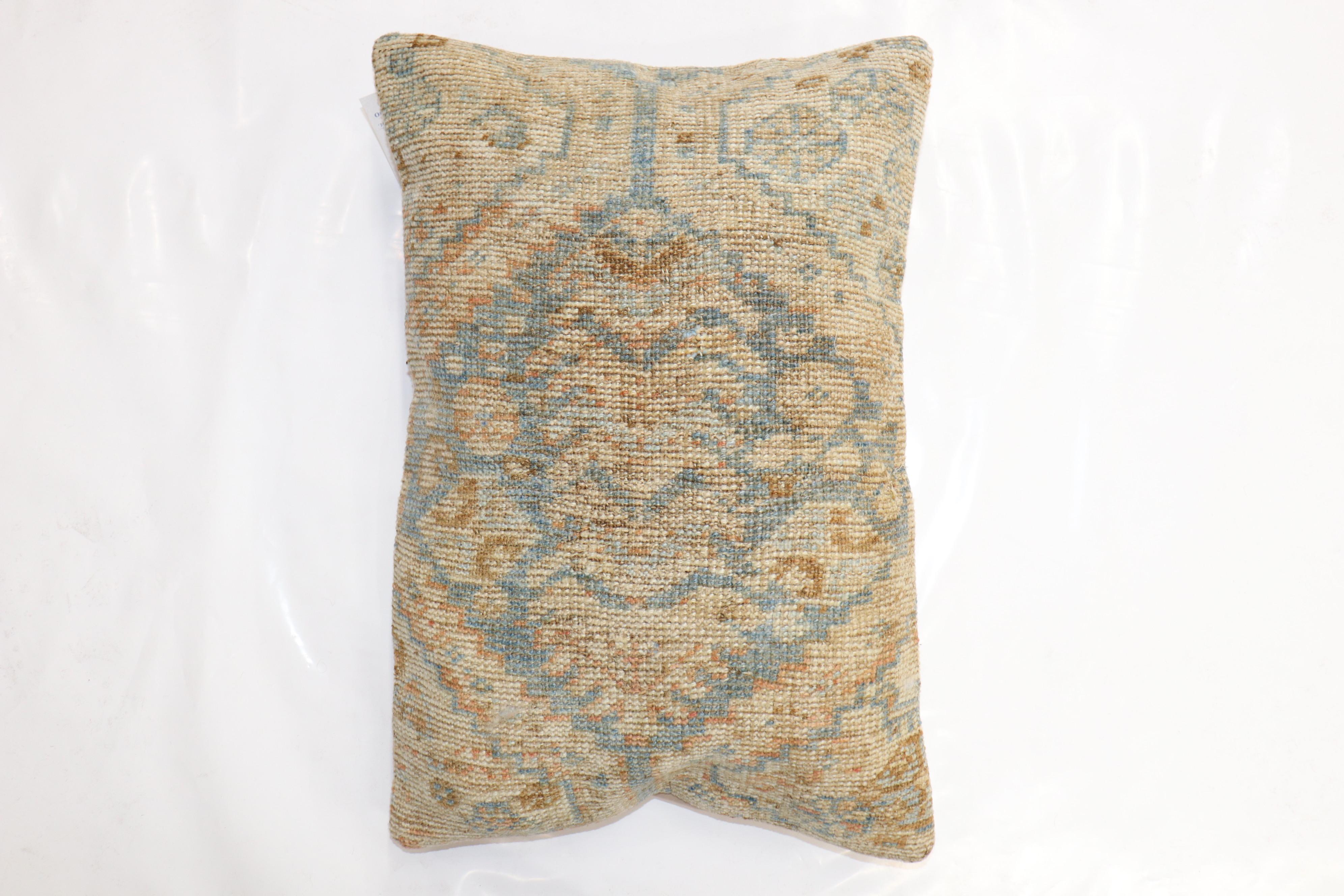 Pillow made from a late 19th-century antique Persian Bakshaish rug with cotton back. Zipper closure.

Measures: 16'' x 24''.