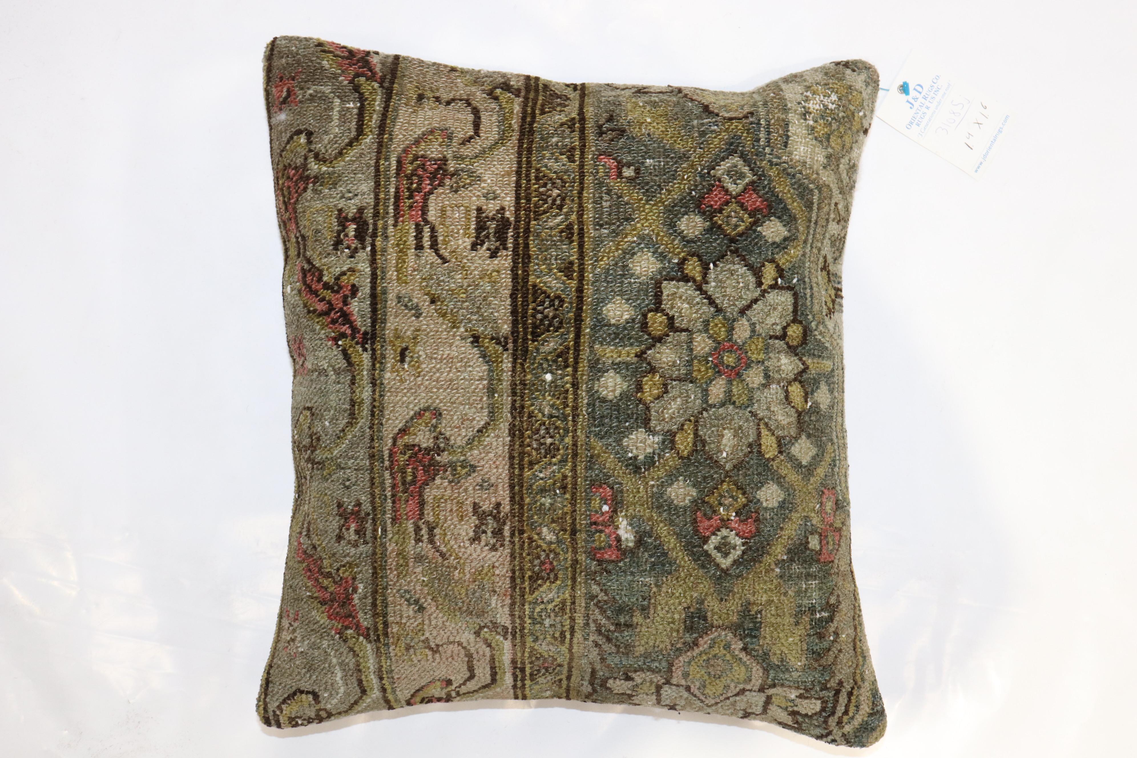 Pillow made from an antique Persian Bibikabad rug.

16'' x 18''