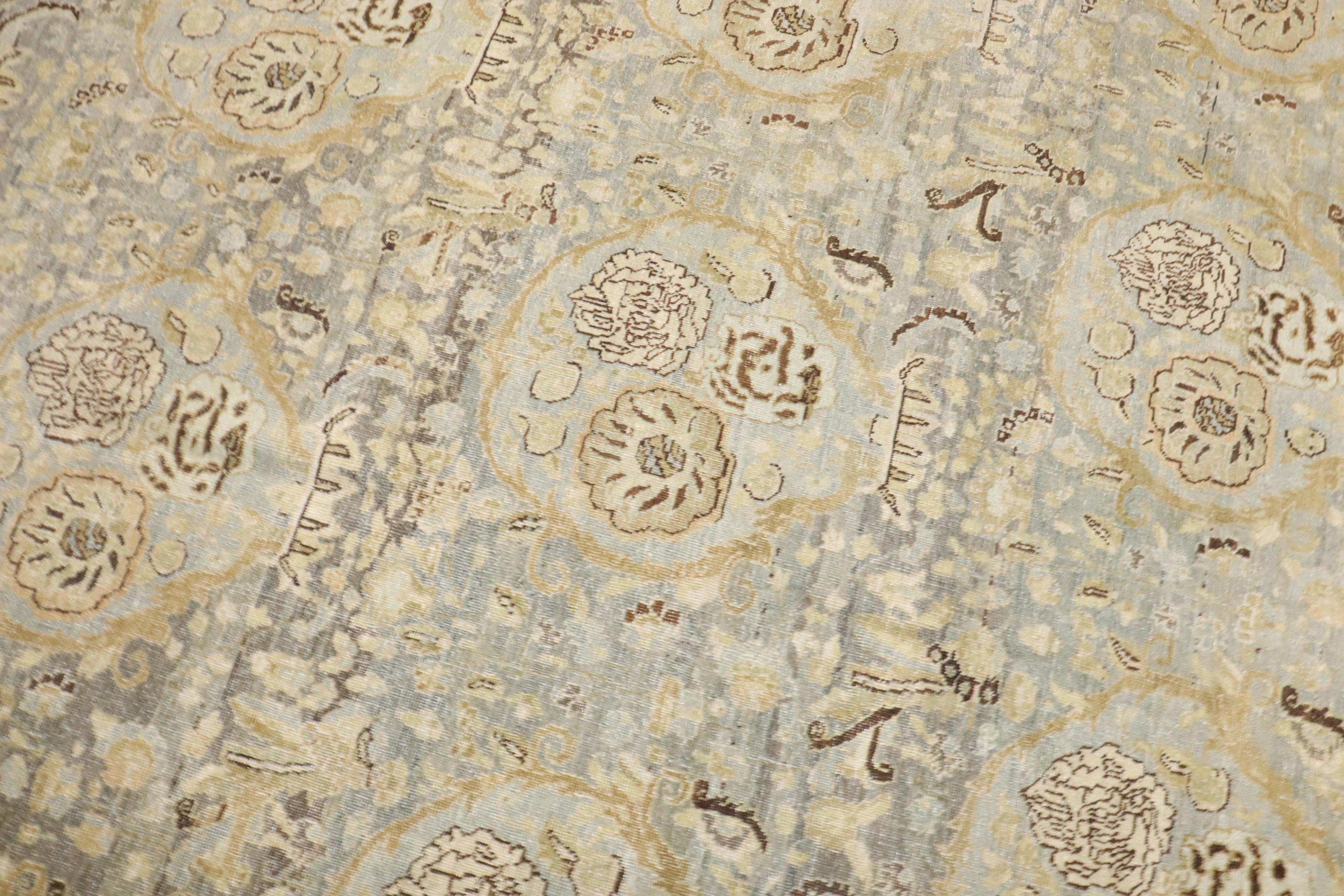 an early 20th century Persian Bidjar Rug in soft blueish gray and gold tones throughout

Details
rug no.	j4004
size	9' 7