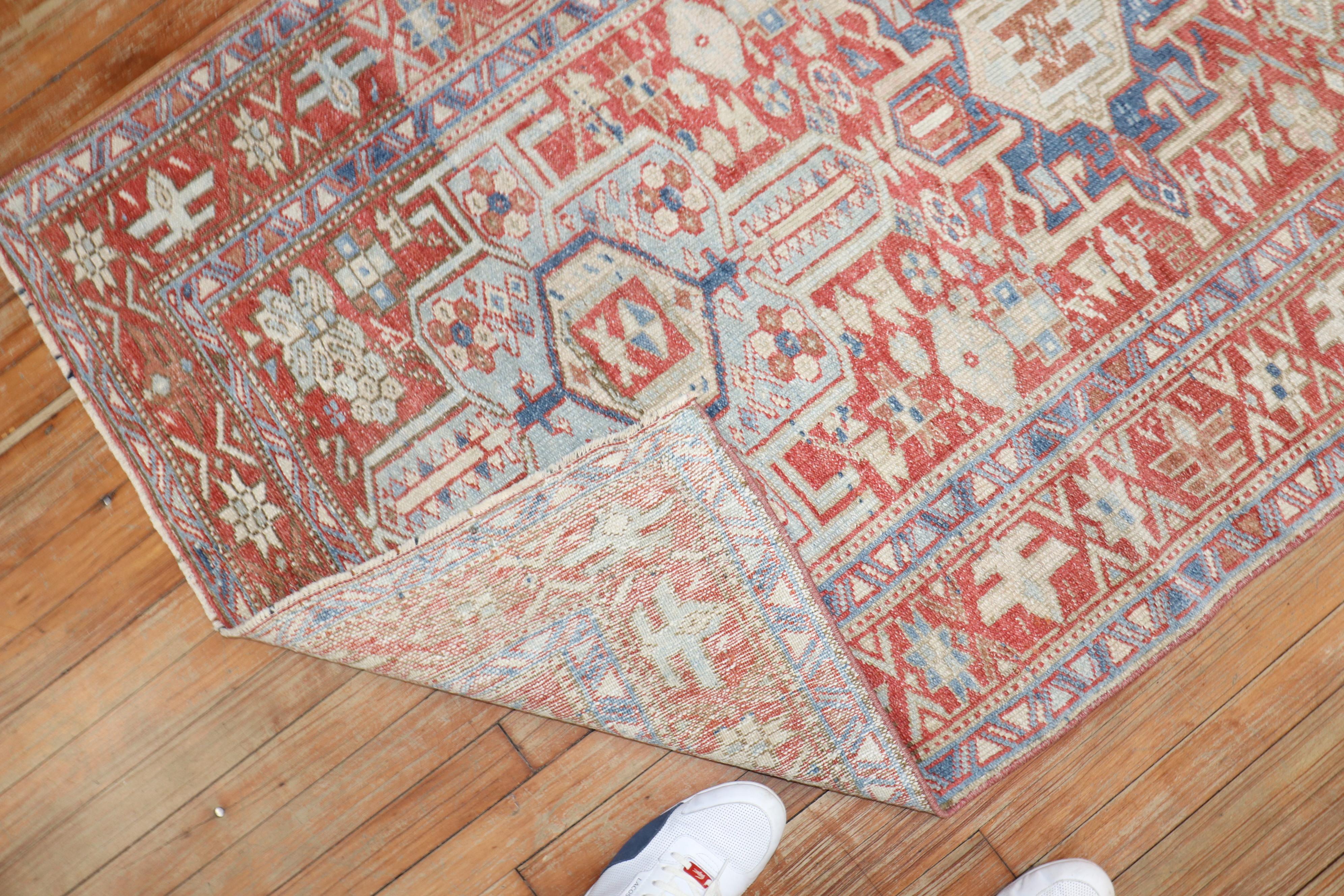 an early 20th Century Persian Heriz Runner 

3'6'' x 9'11''