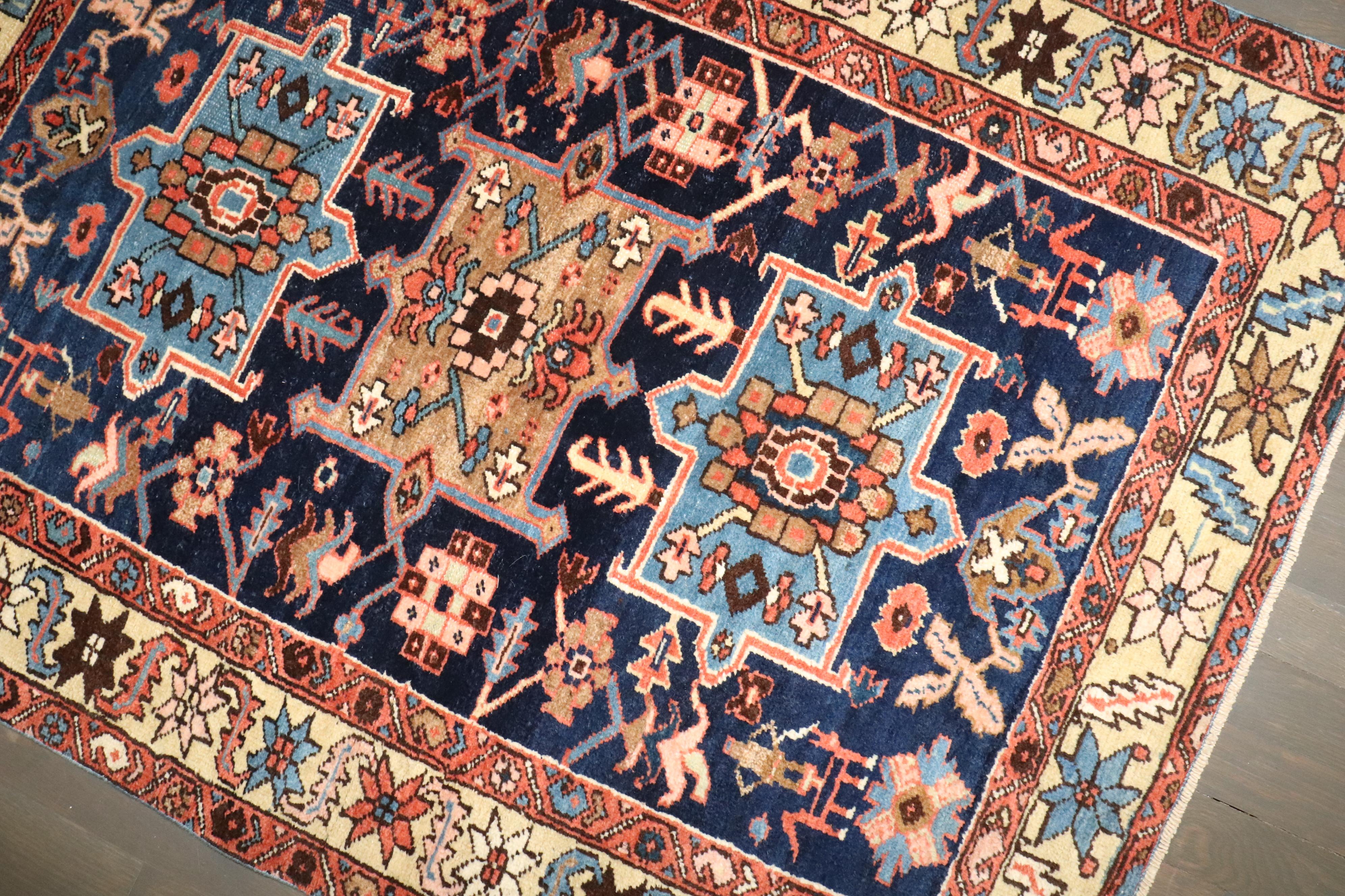 An early 20th Century Persian Heriz Serapi small square rug in predominantly navy

Details
rug no.	j4434
size	3' 2