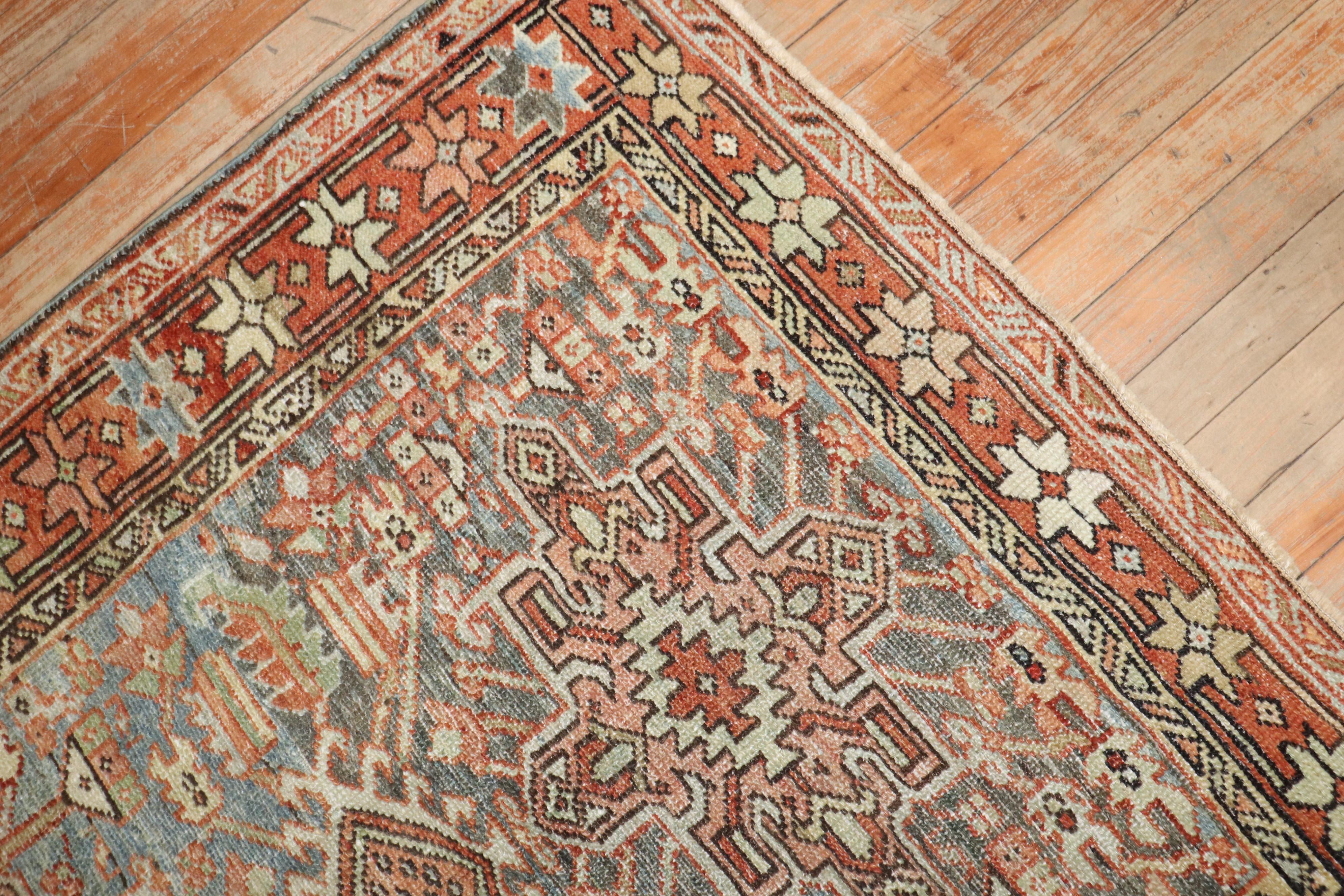 An early 20th century Square Persian Heriz rug 

3'6'' x 3'11''