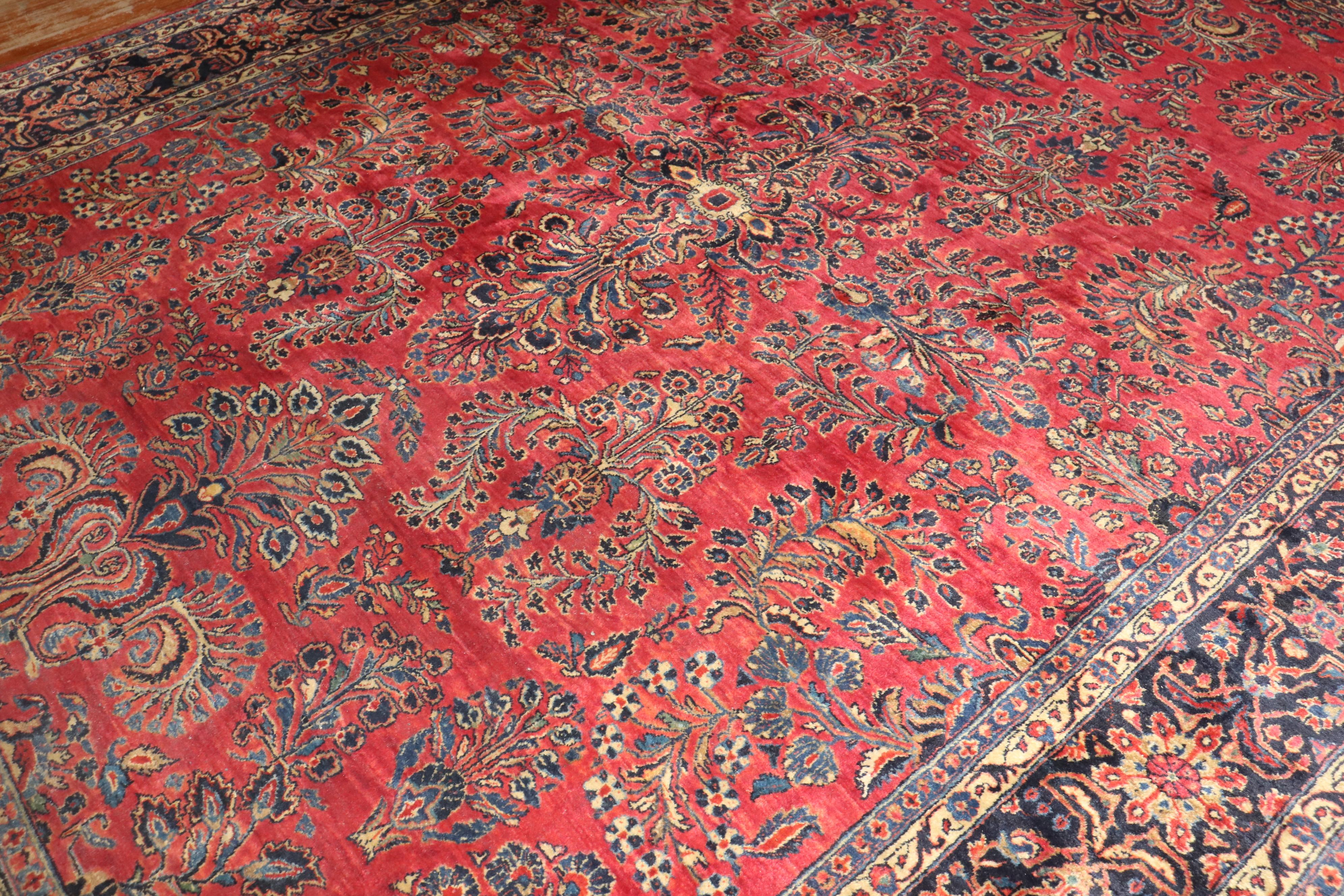 An early 20th century traditional Persian Sarouk rug 

Measures: 8'8'' x 11'6”.

.