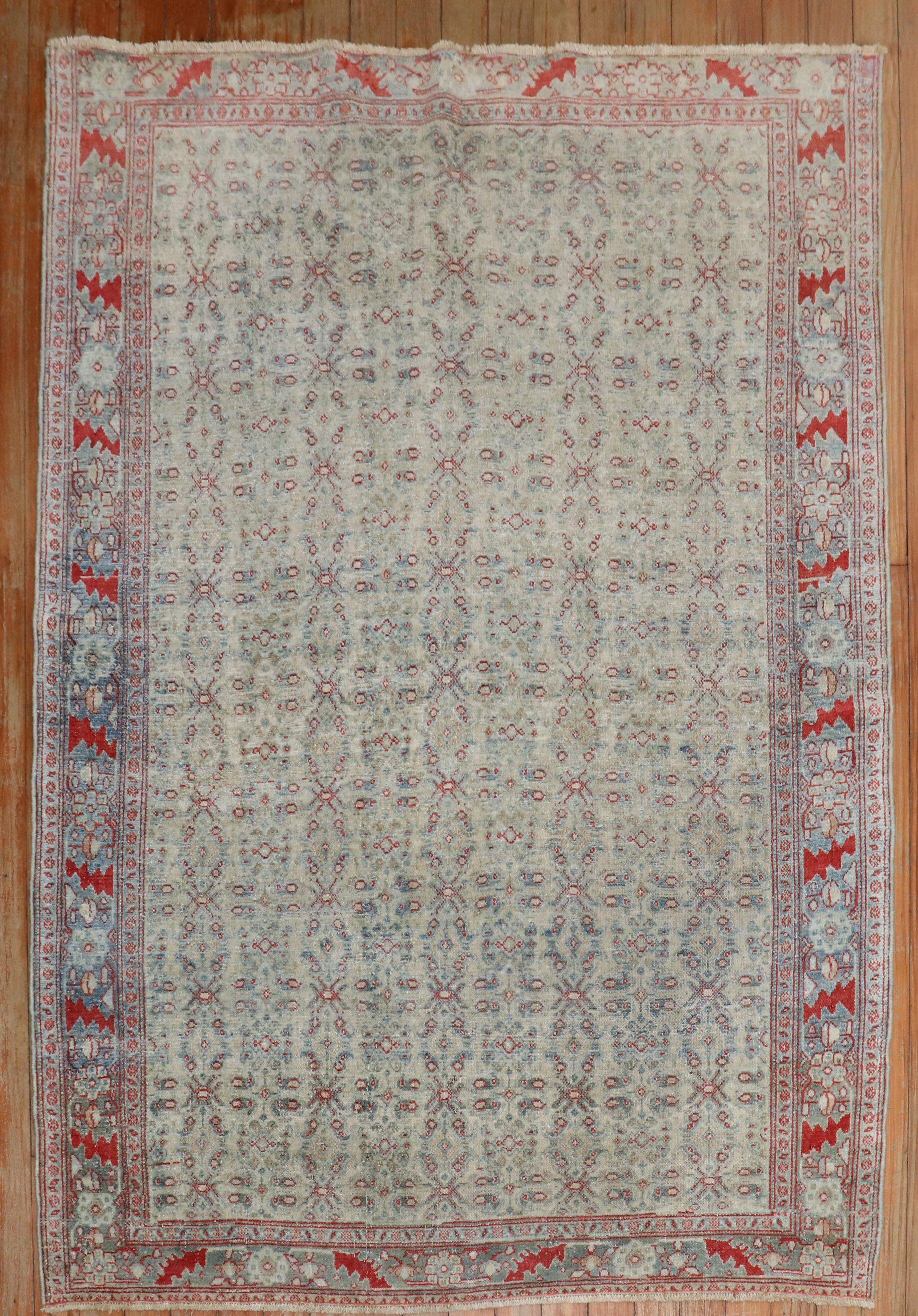 an early 20th century Persian scatter size rug

Measures: 3'6