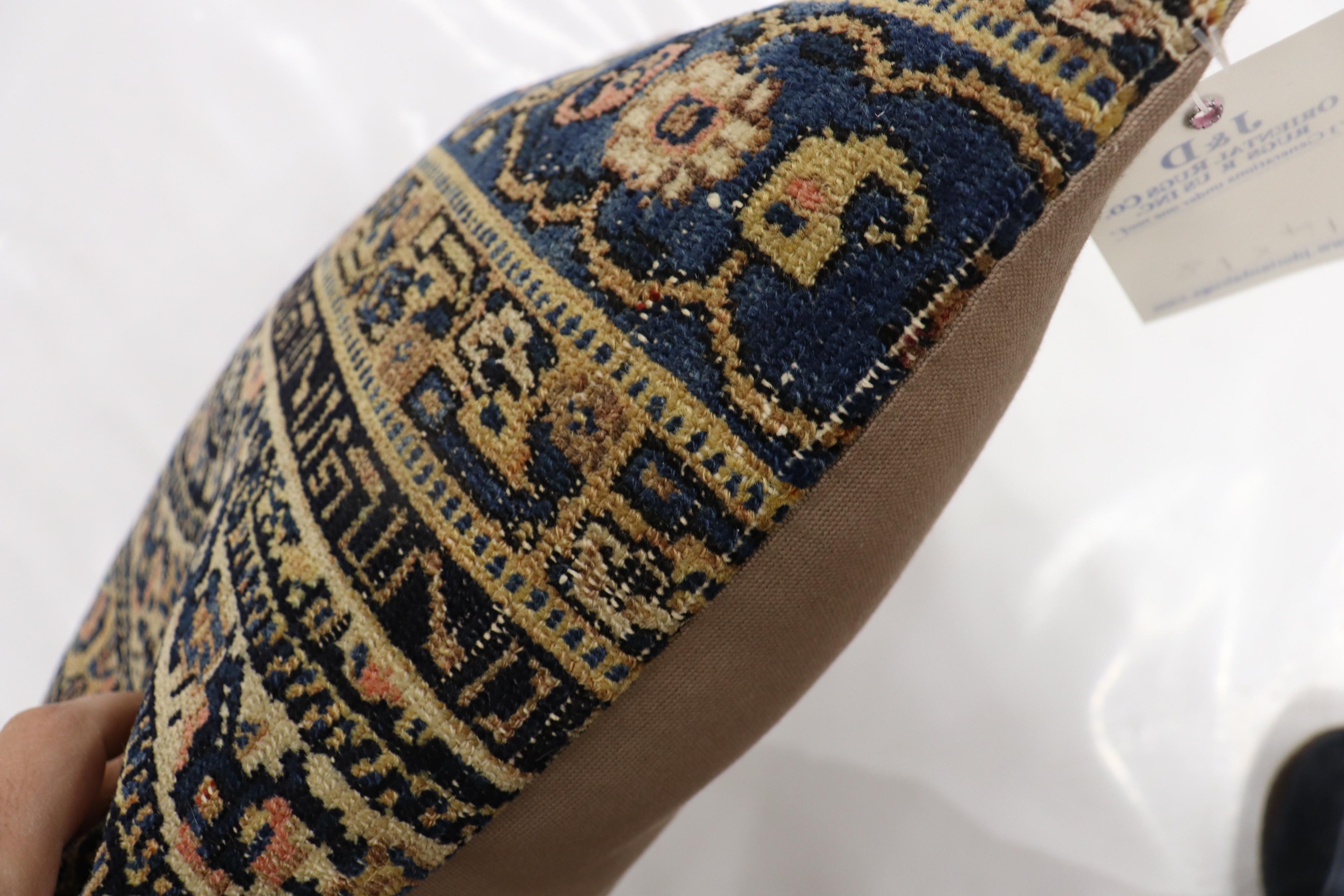 Pillow made from a finely woven Persian Senneh rug.

Measures: 18'' x 23''.