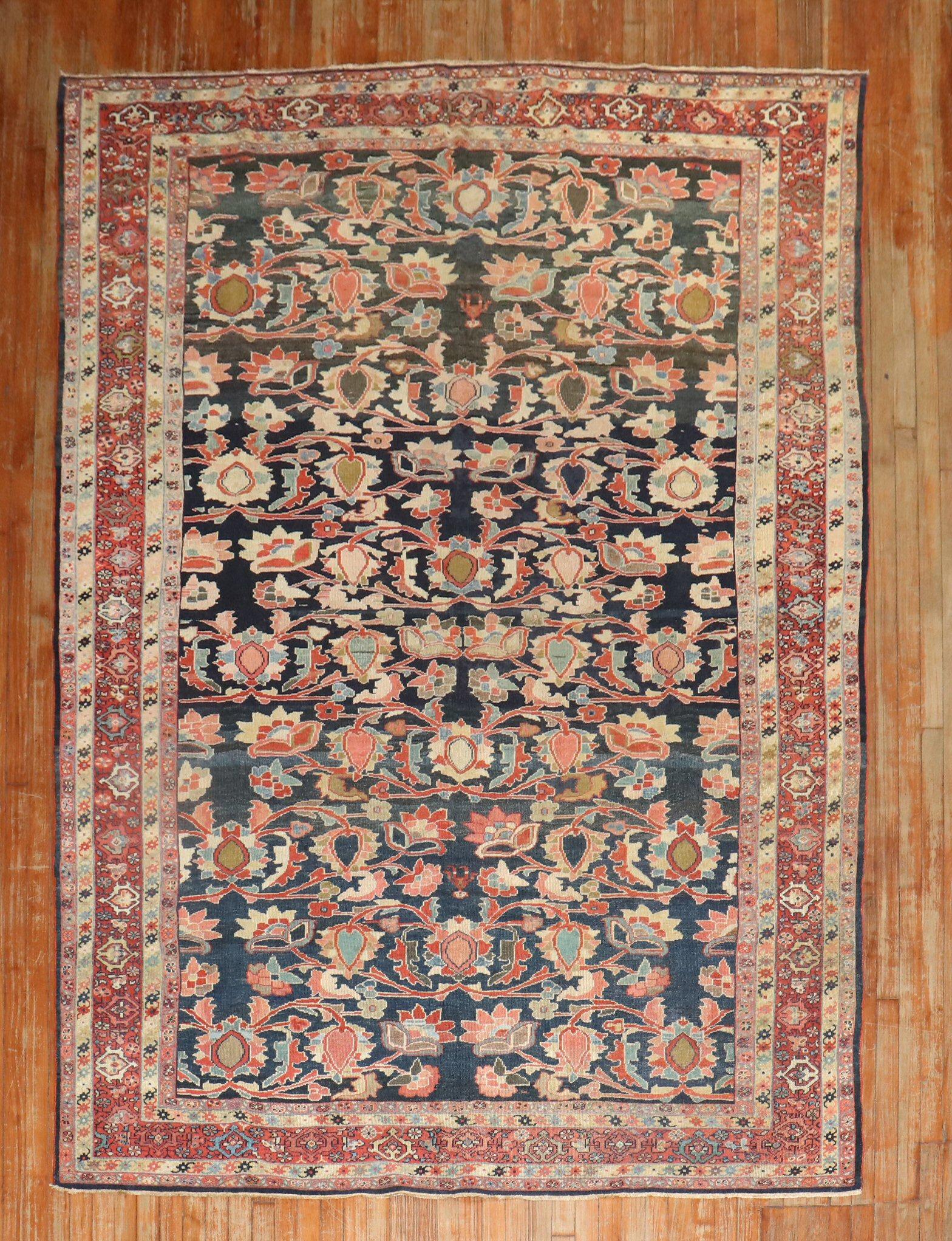an early 20th Century Persian Sultanabad Rug

size	6'9