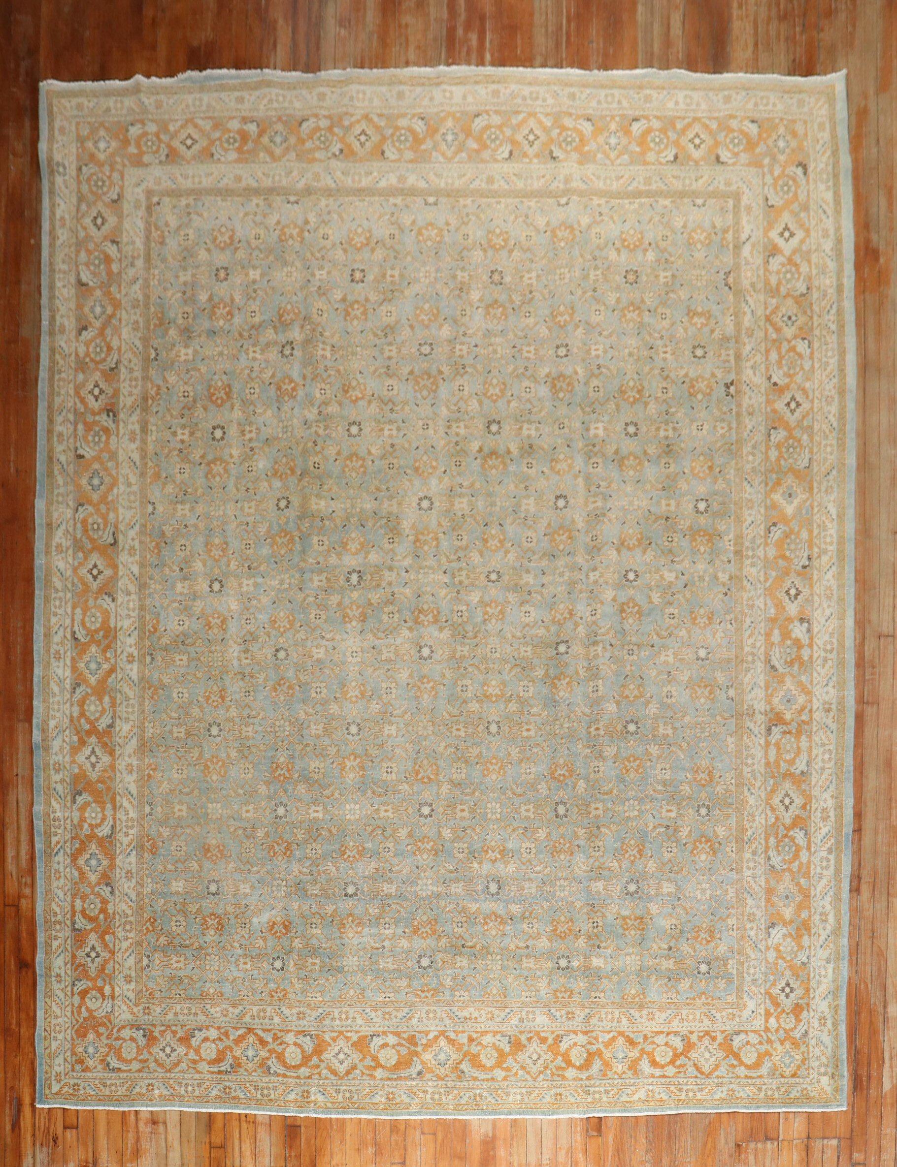 Ein persischer Täbriz-Teppich aus dem frühen 20. Jahrhundert in Orange und Blau mit Akzenten in Elfenbein und Braun.

Einzelheiten
Teppich nein.	j2906
Größe	10' 4