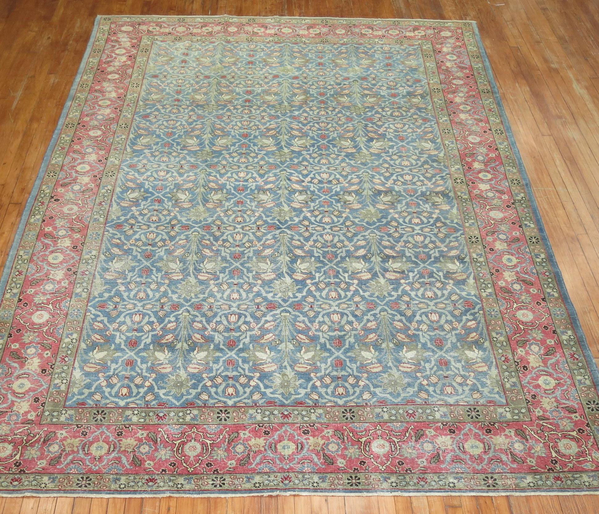 An early 20th-century highly decorative Persian Tabriz rug 

Measures: 8'2'' x 11'8''