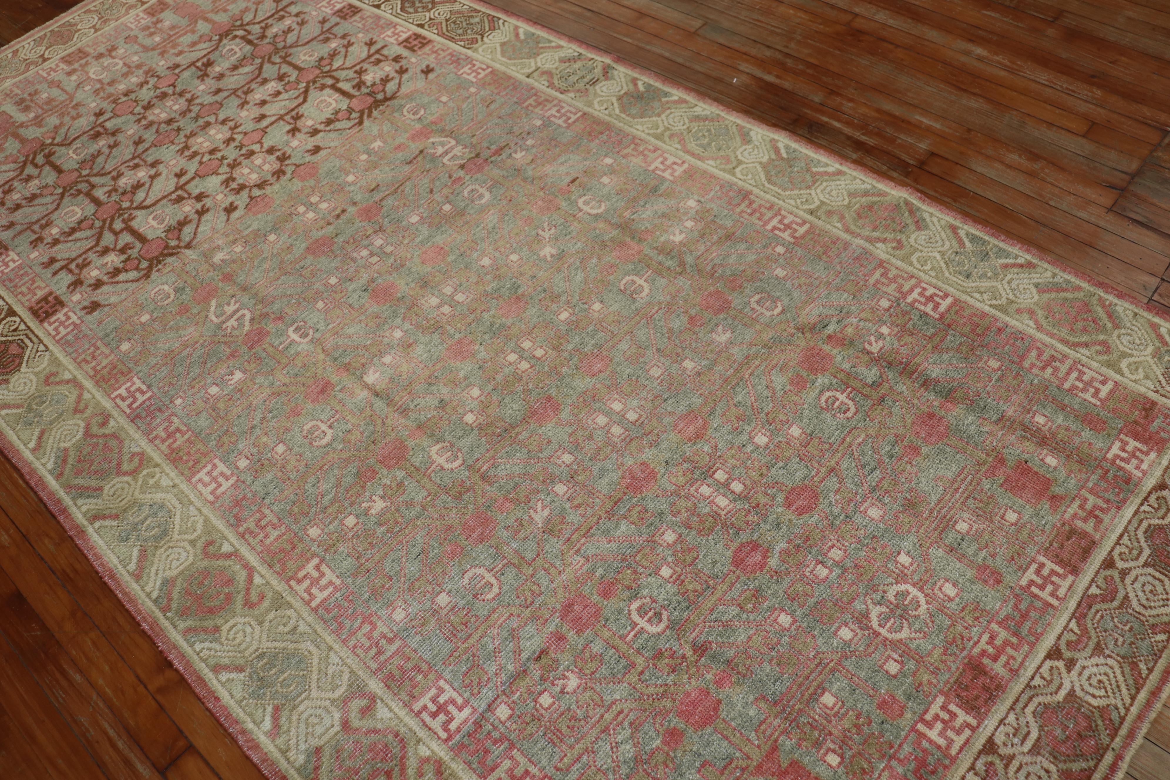 a Pink and celadon Green Gallery Khotan from the early 20th century

Details
rug no.	j2103
size	5' 1