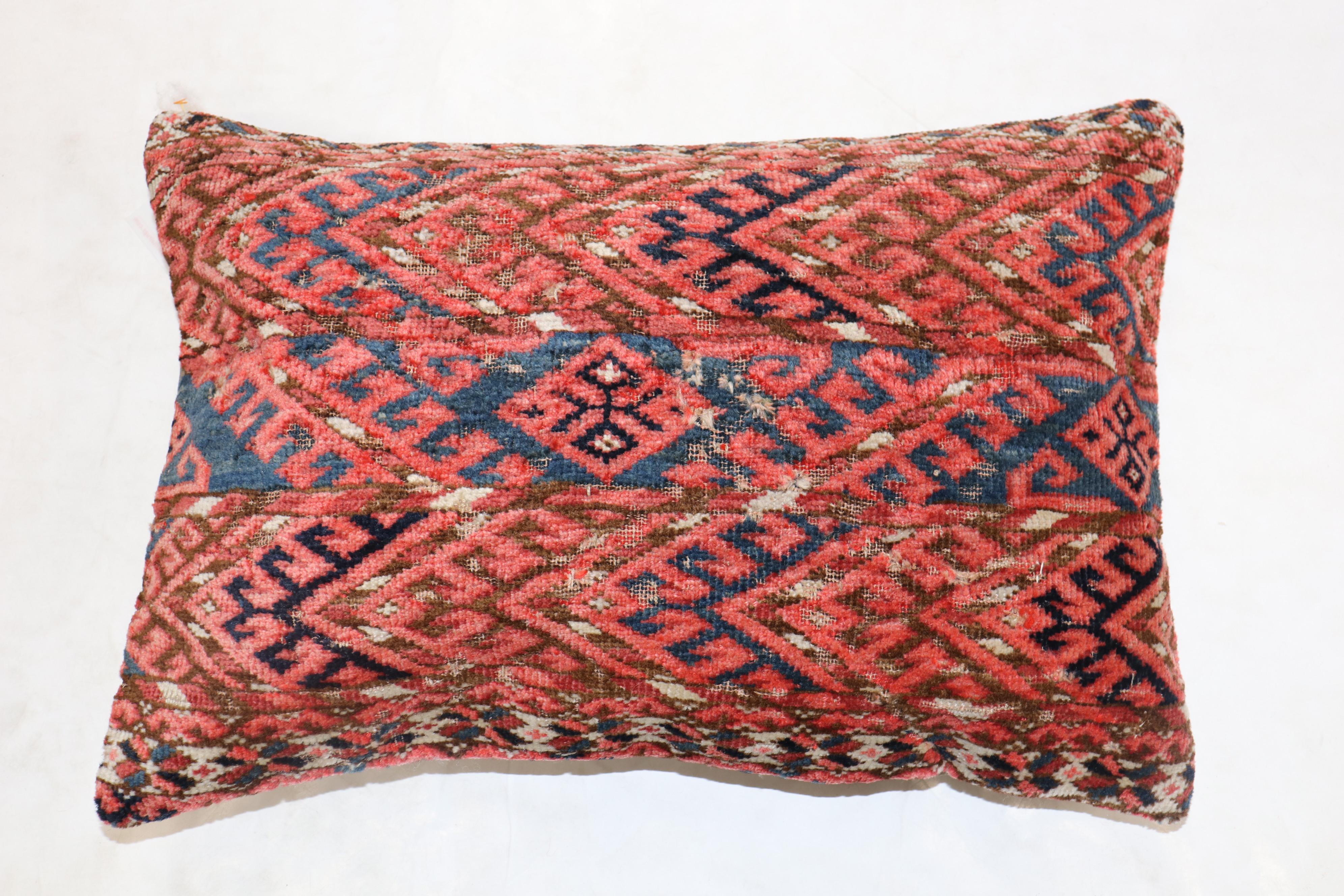 Pillow made from a 19th-century Tekke rug in a lumbar size.

Measures: 16