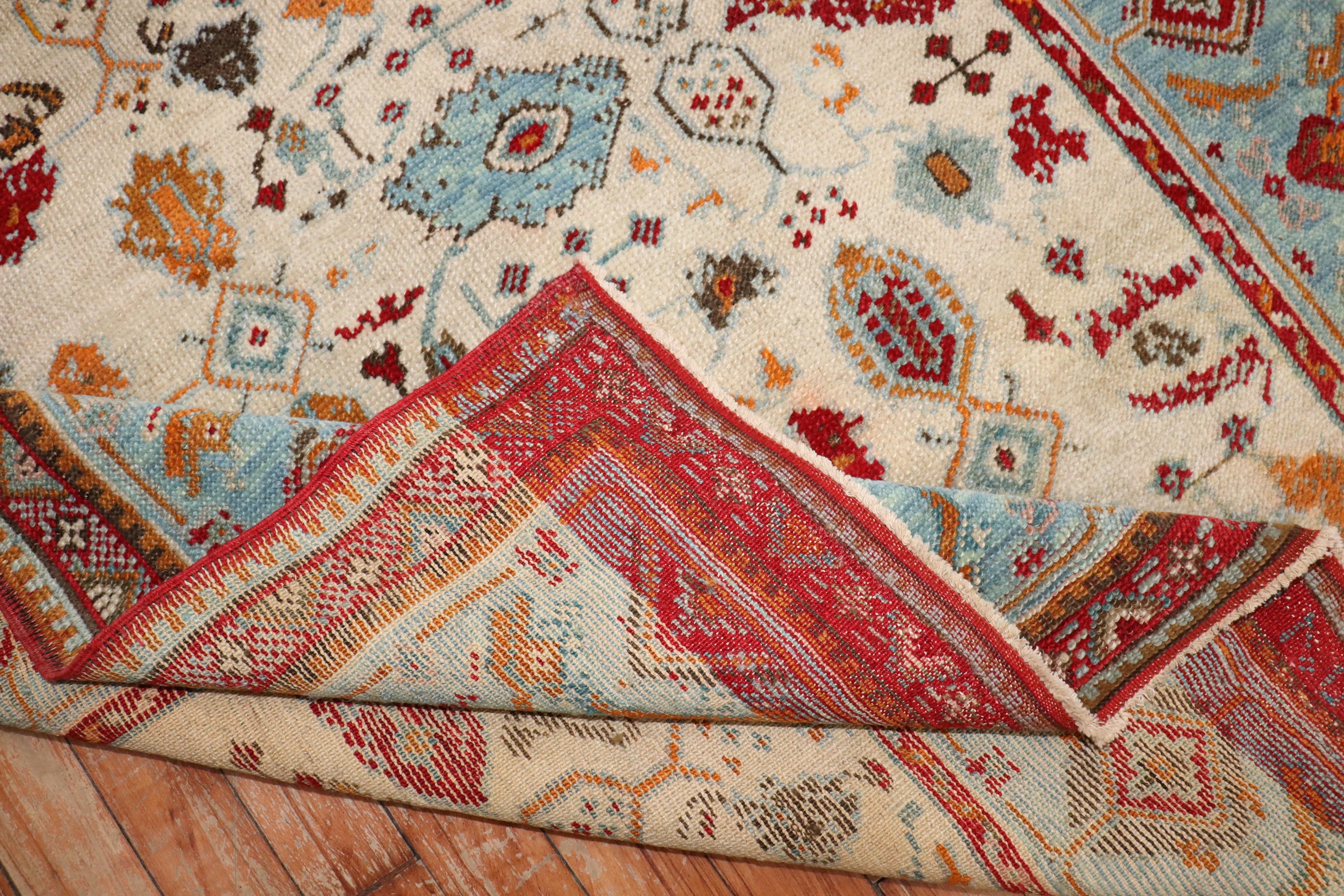 an early 20th-century fun color small size Turkish Ghiordes decorative rug.

Measures: 3'9'' x 5'11''.