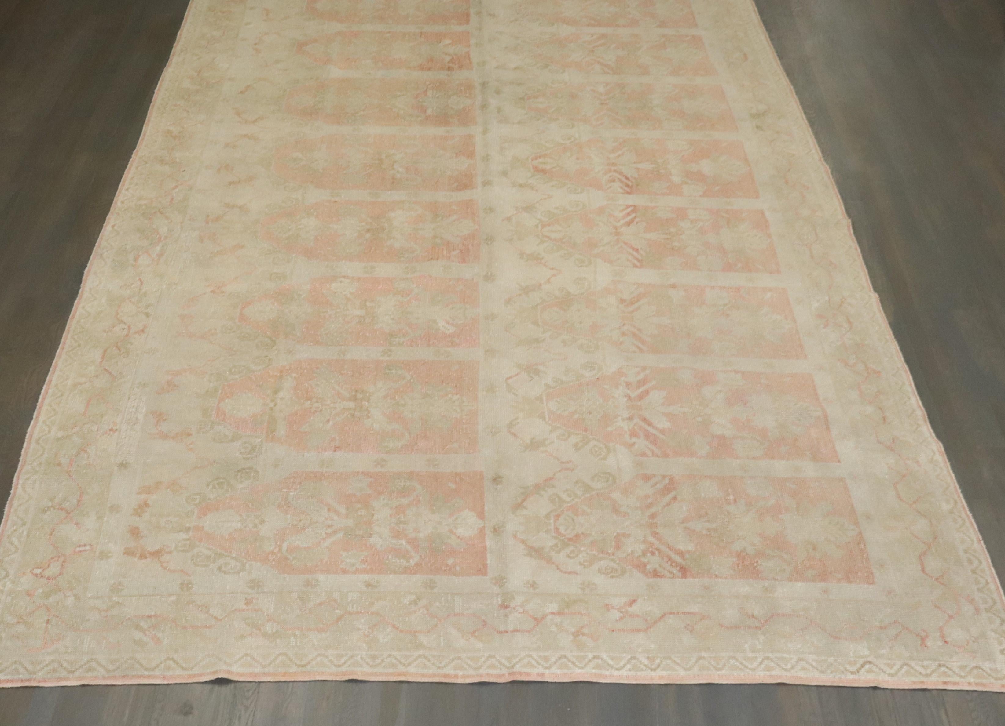 an early 20th Century Pale Pink and Cream Turkish Ghiordes Corridor Runner

Details
rug no.	10653
size	8' 4