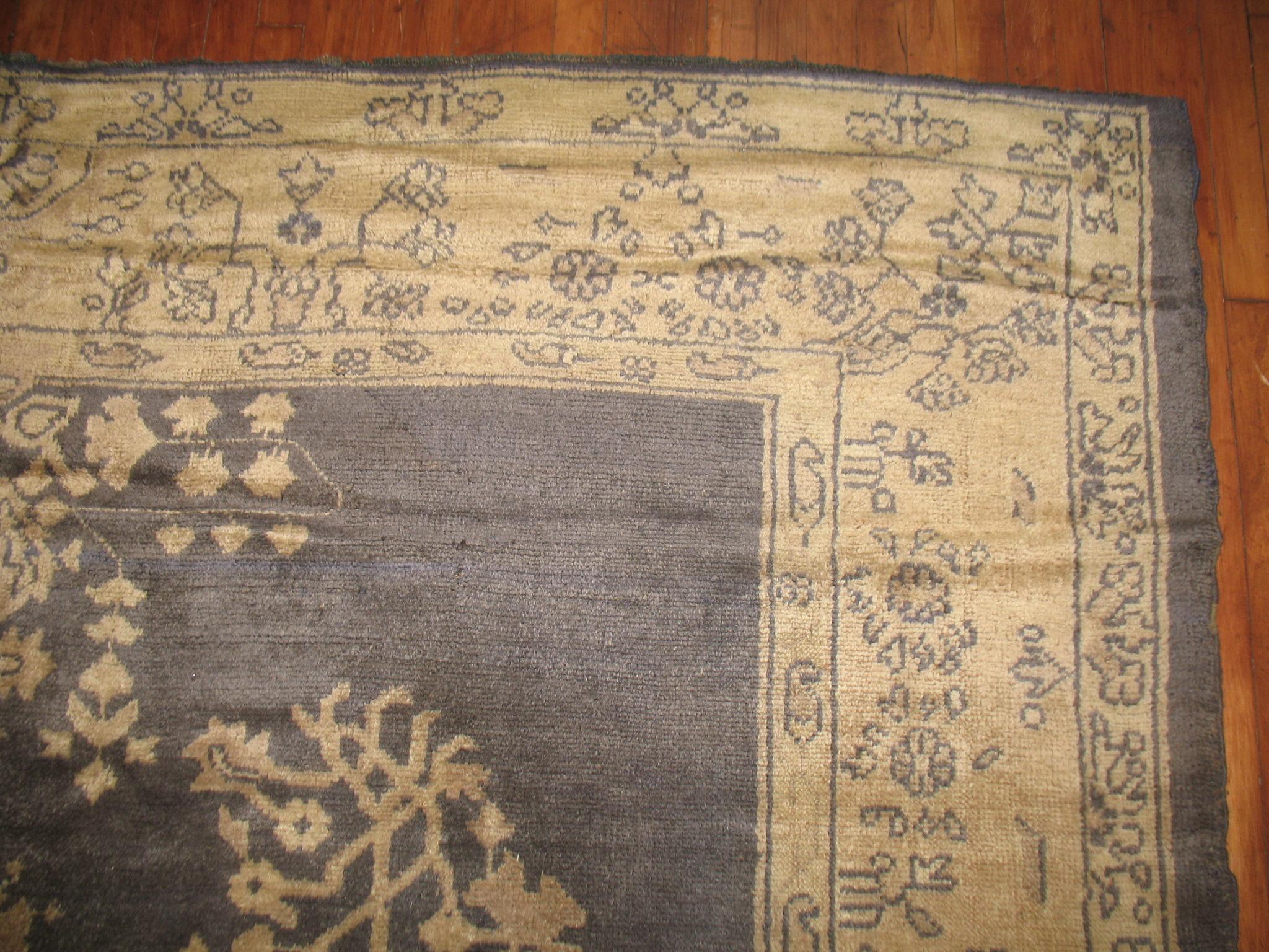 An early 20th-century square room-size Turkish Oushak rug 

Measures: 8'8'' x 10'8