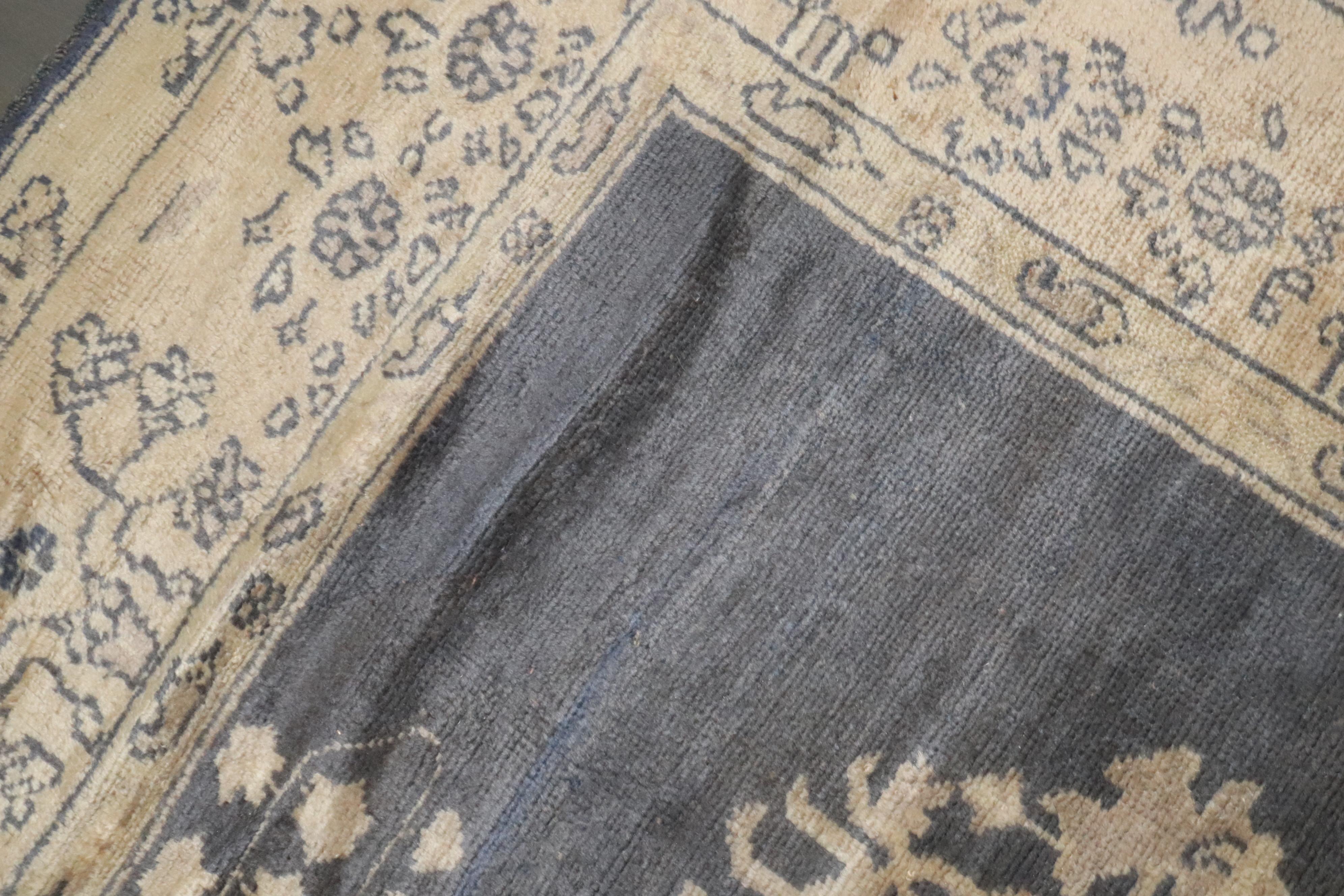 An early 20th-century square room-size Turkish Oushak rug 

Measures: 8'9'' x 10'9