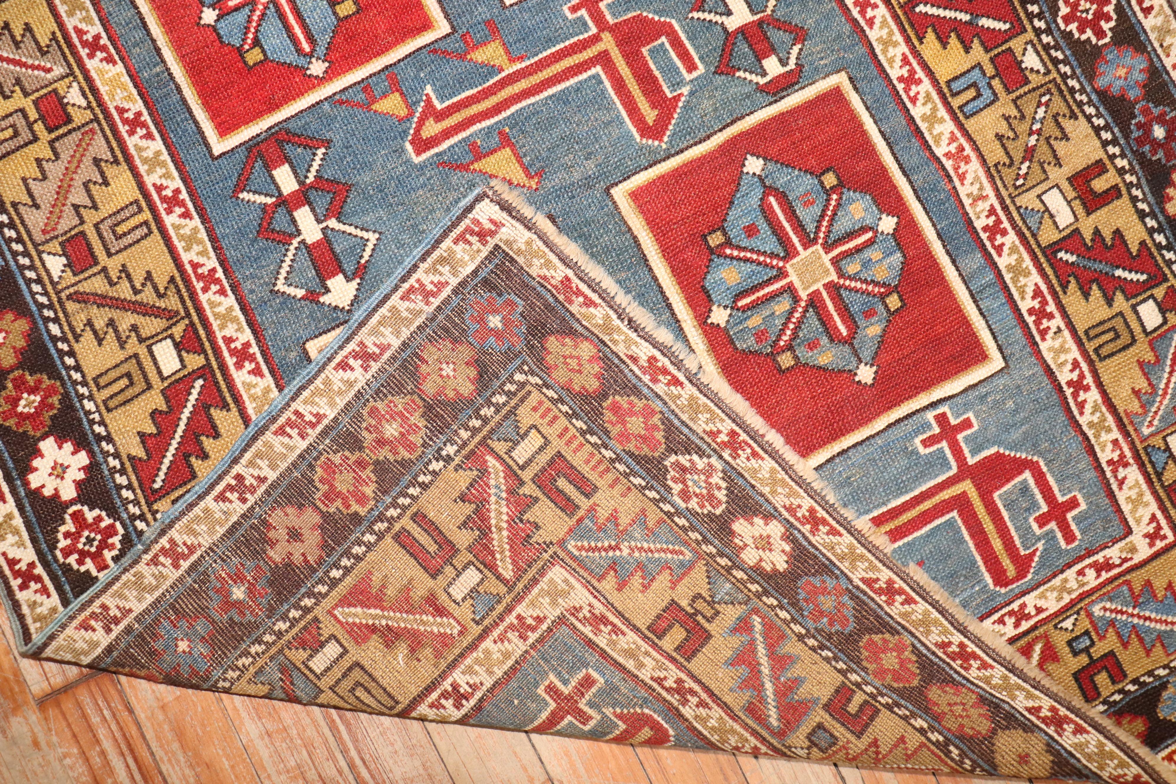A late 19th century  woven antique Karaghasli Caucasian rug.

3' x 5'

The brilliant colors and use of lateral elements make this a unique addition to any collection. These carpets were introduced into Russian hands by the market demand initially