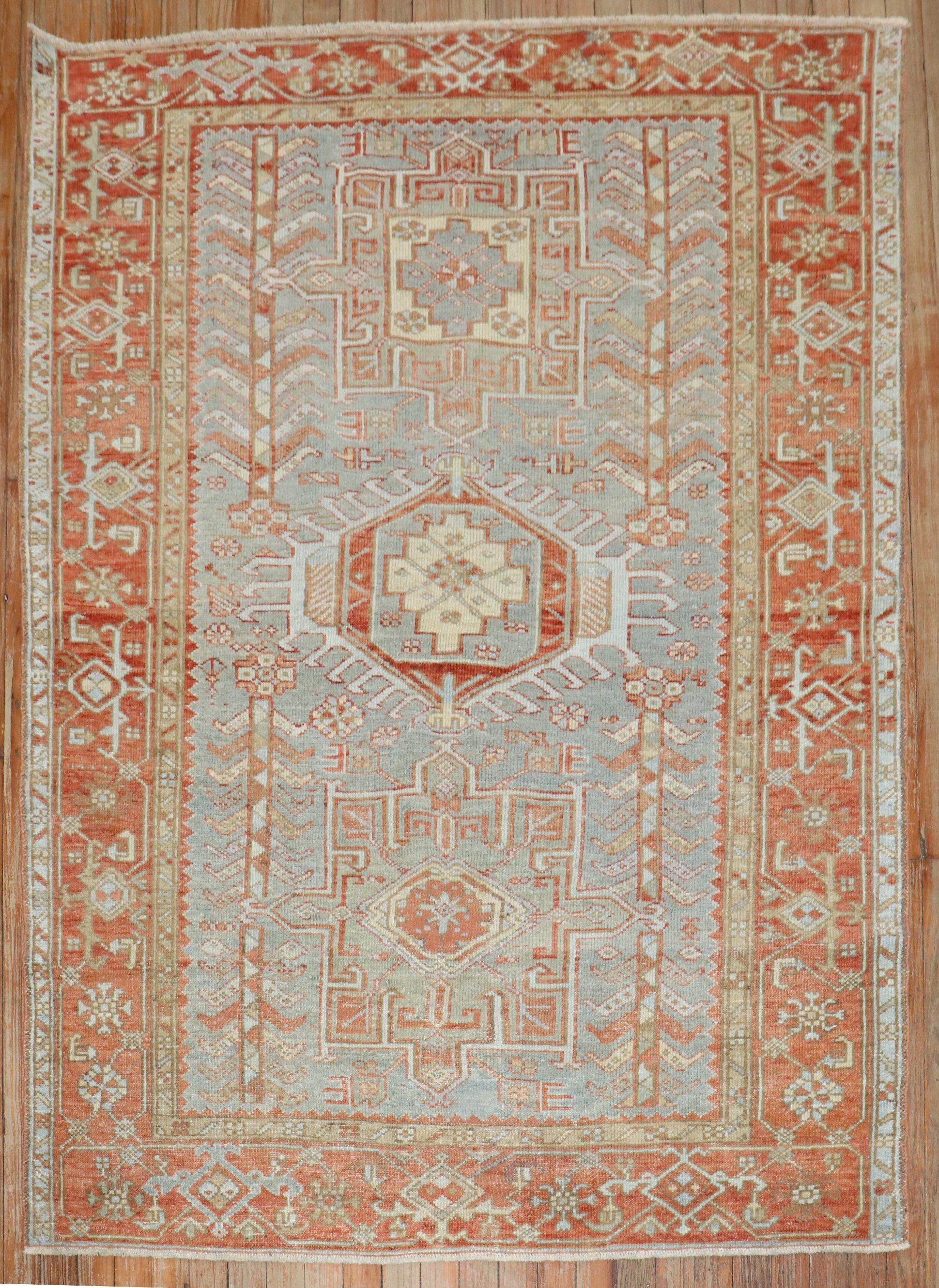 an early 20th-century Persian Heriz accent rug in blues and apricot

Details
rug no.	j3827
size	4' 5