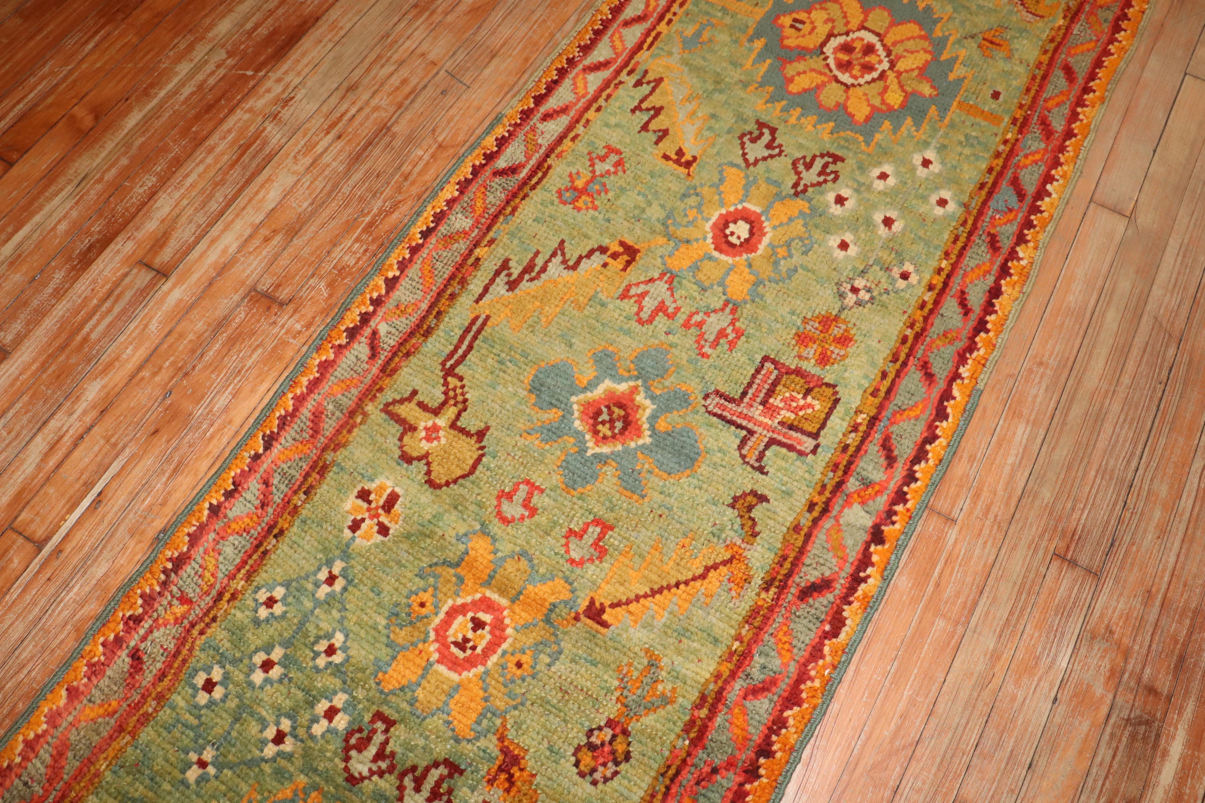 20th Century Zabihi Collection Bright Green Antique Colorful Oushak Runner For Sale