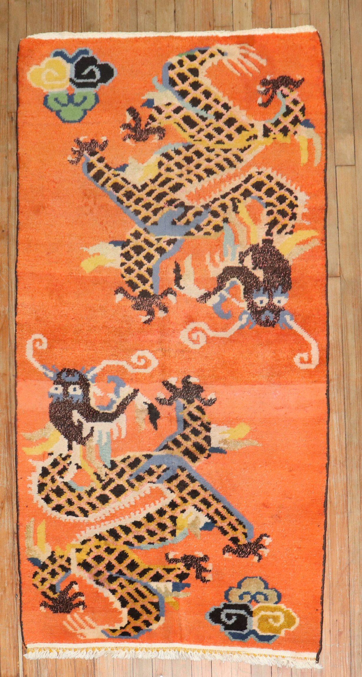 20ième siècle Zabihi Collection Bright Orange Dragon Vintage Tibetan Rug (tapis tibétain vintage) en vente