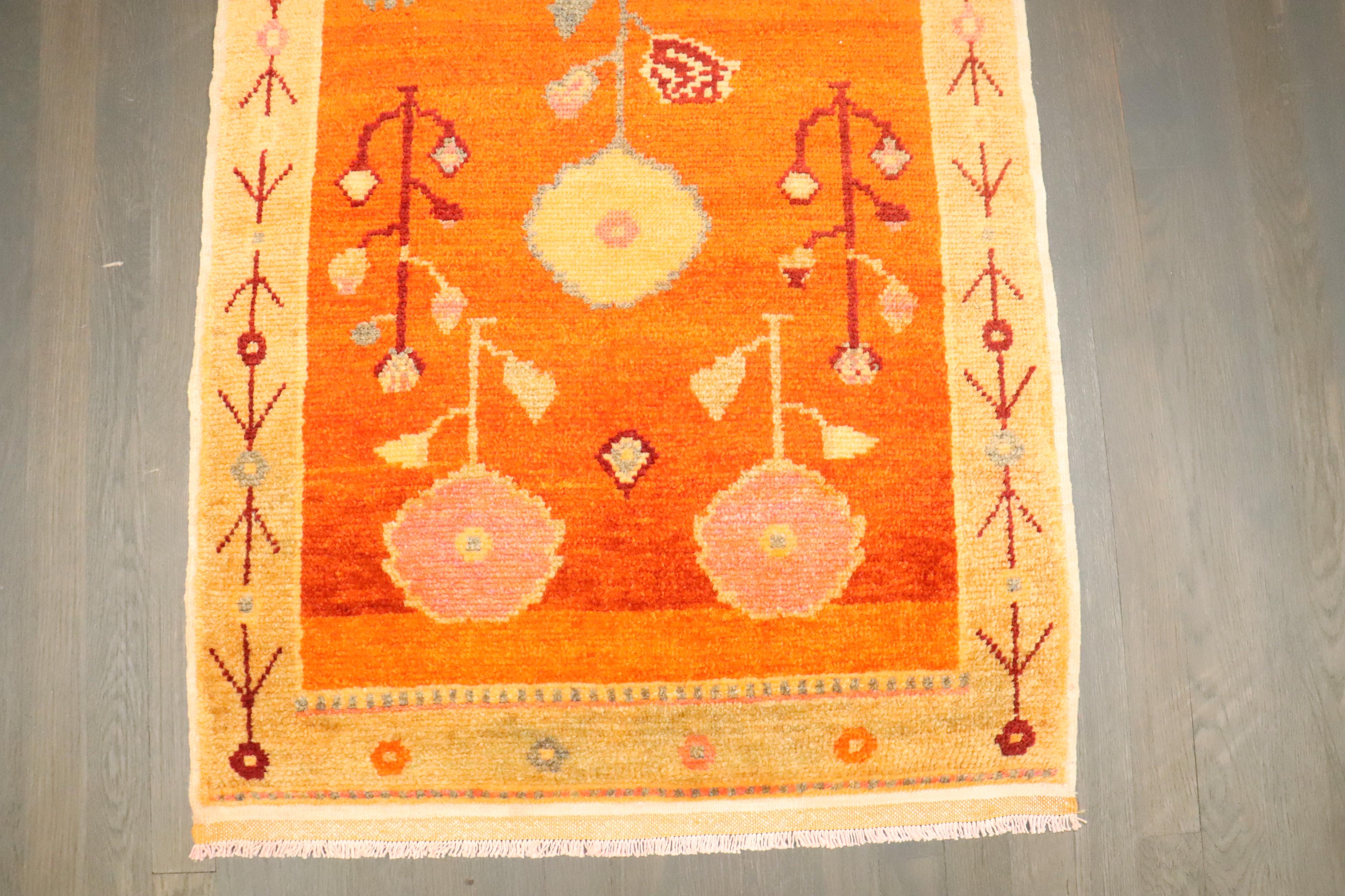 a mid 20th Century Turkish Anatolian rug in bright orange

Details
rug no.	j4232
size	2' 7