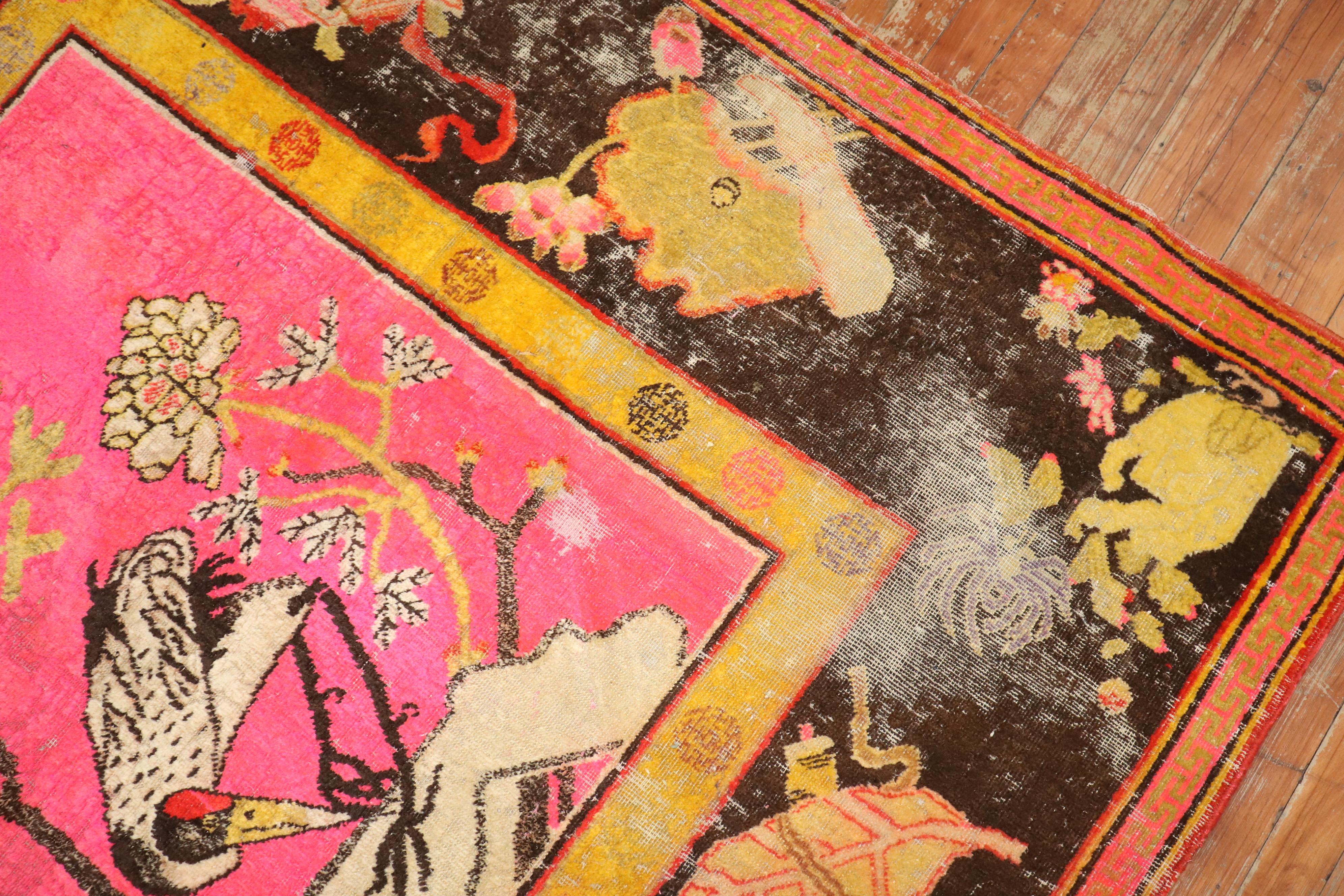 19th Century Zabihi Collection Bright Pink Antique Worn Flamingo Pictorial Khotan Rug For Sale