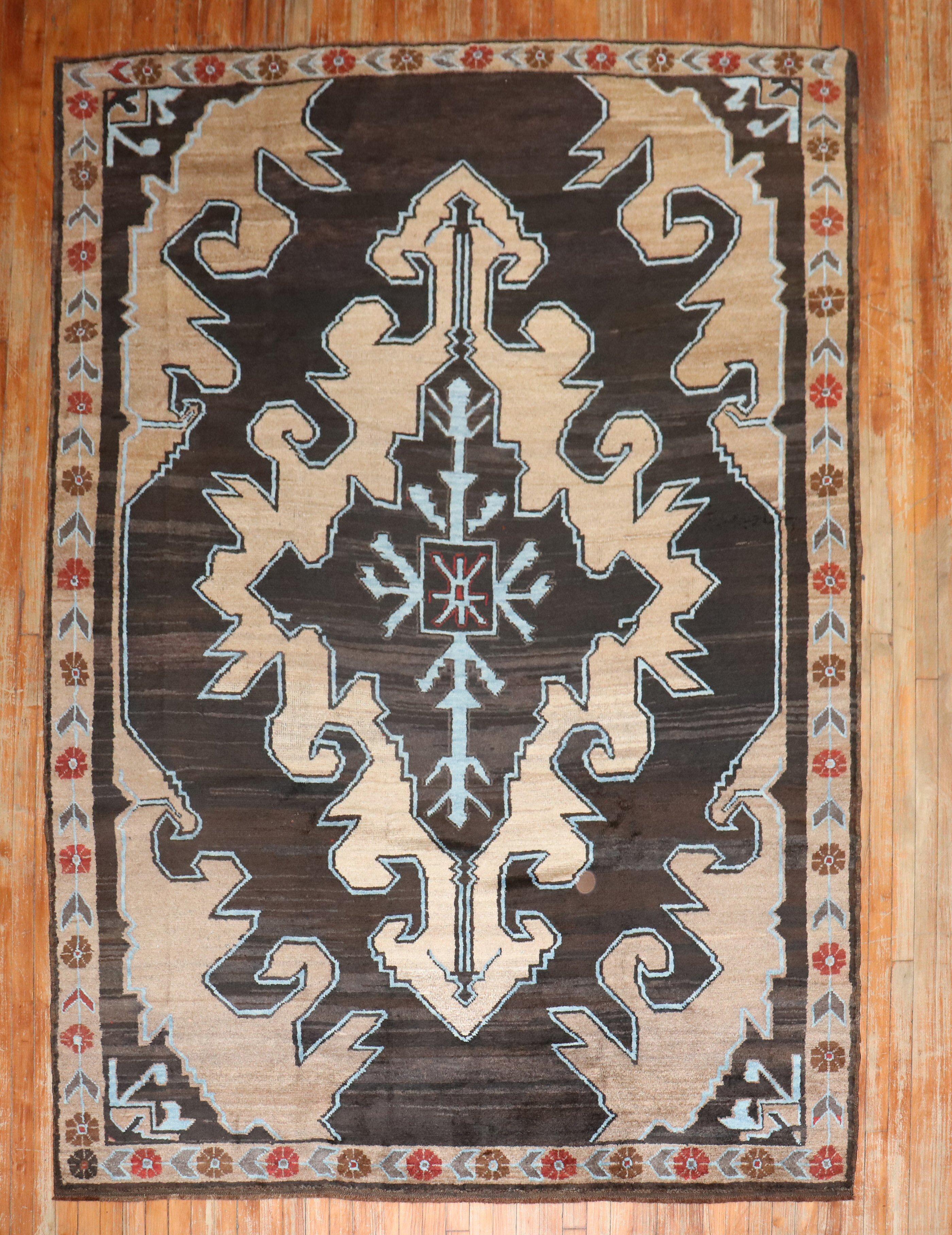 Masculine best describes this mid 20th Century Turkish Kars rug

Measures: 6'8 x 9' 