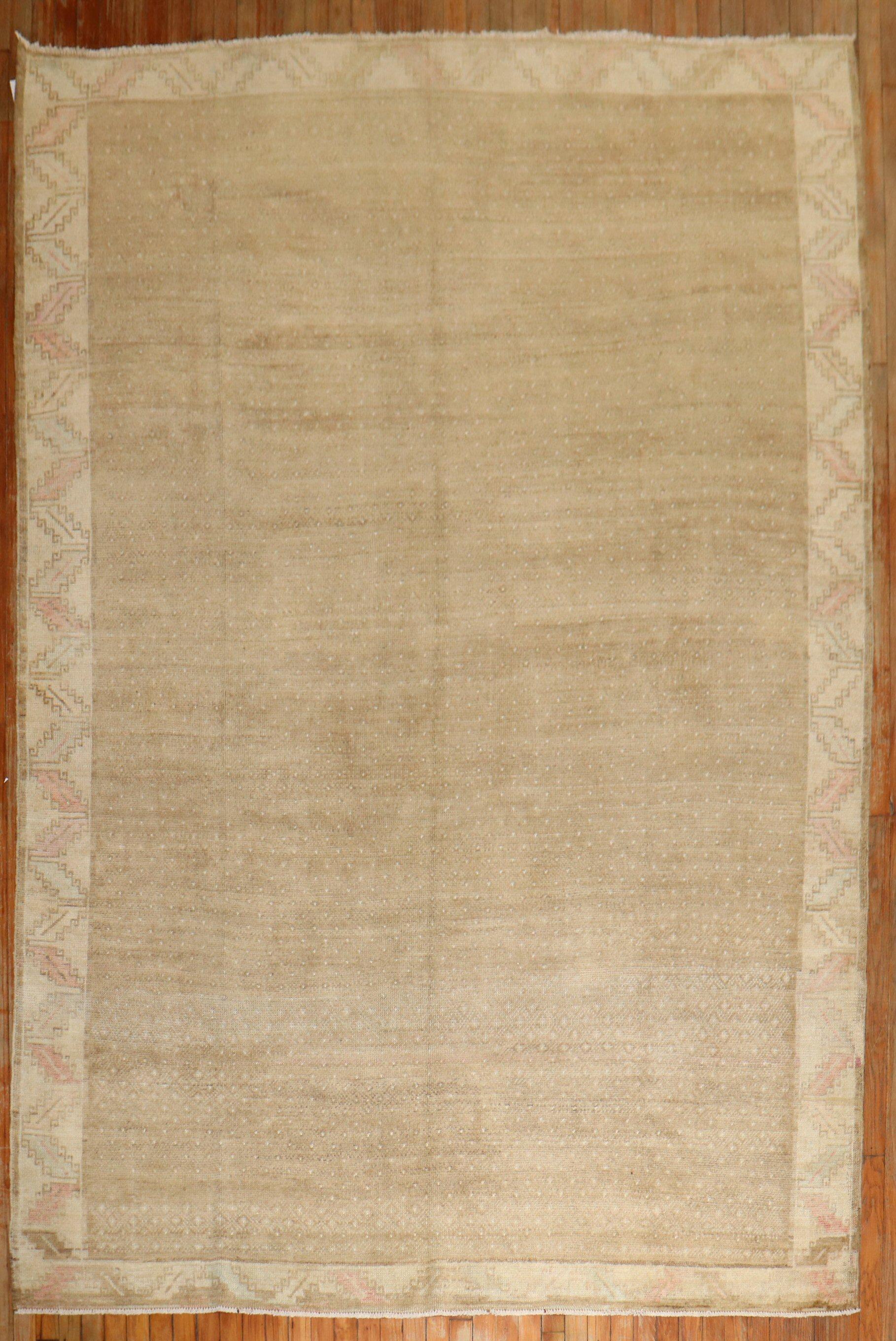 A small room-size predominantly brown Turkish rug.

Measures: 7' x 9'7