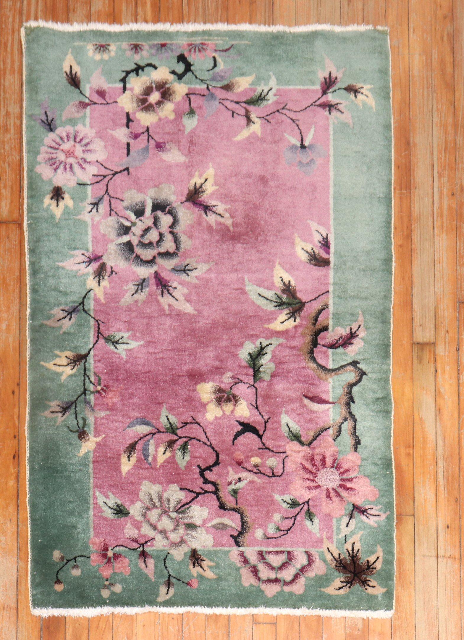 Chinese Nichols art deco scatter size rug in pretty pinks and greens

Measures: 3' x 4'9