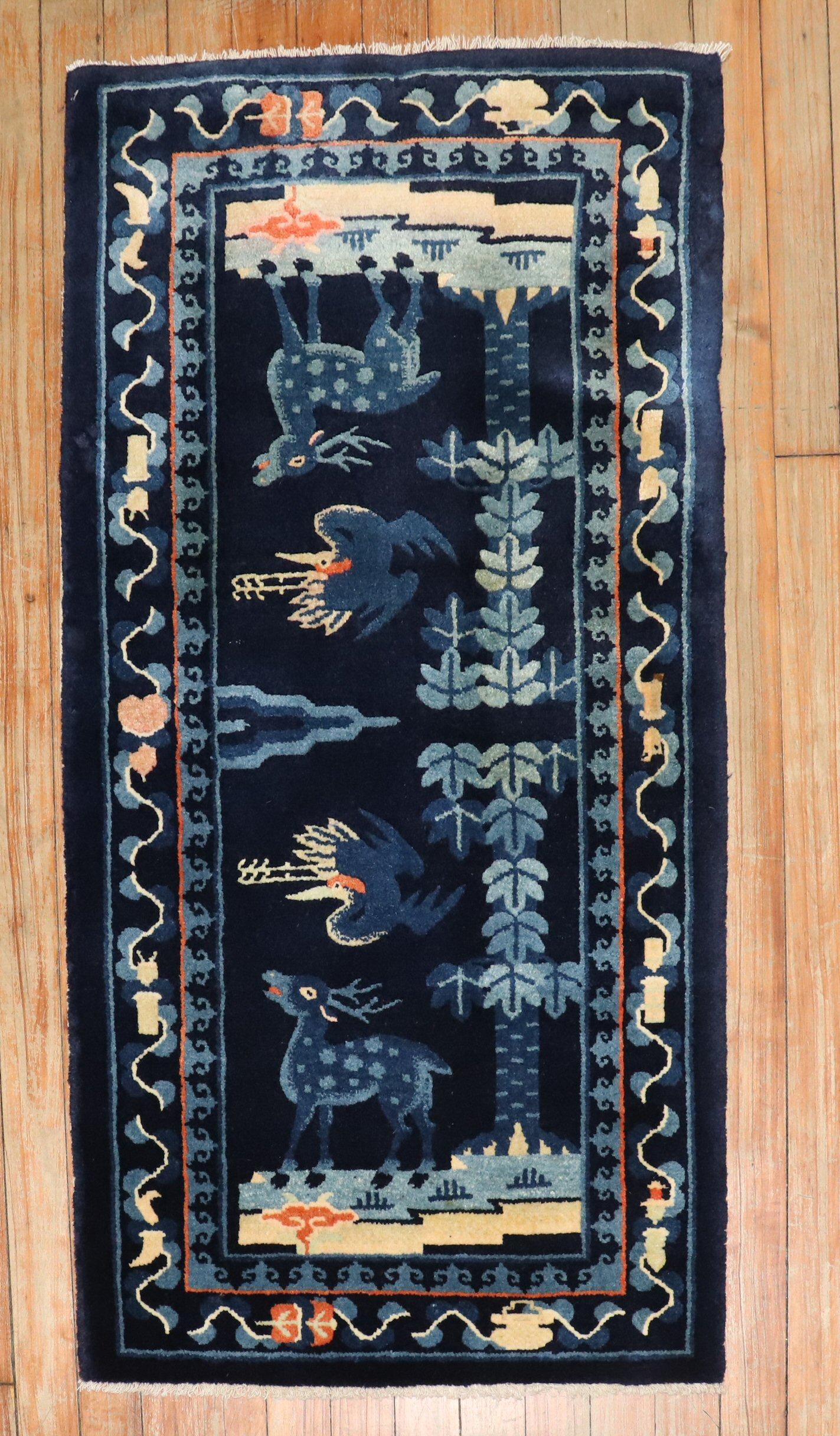 Scatter size Chinese Peking rug from the 2nd quarter of the 20th century with an animal pictorial motif

Measures: 1'11