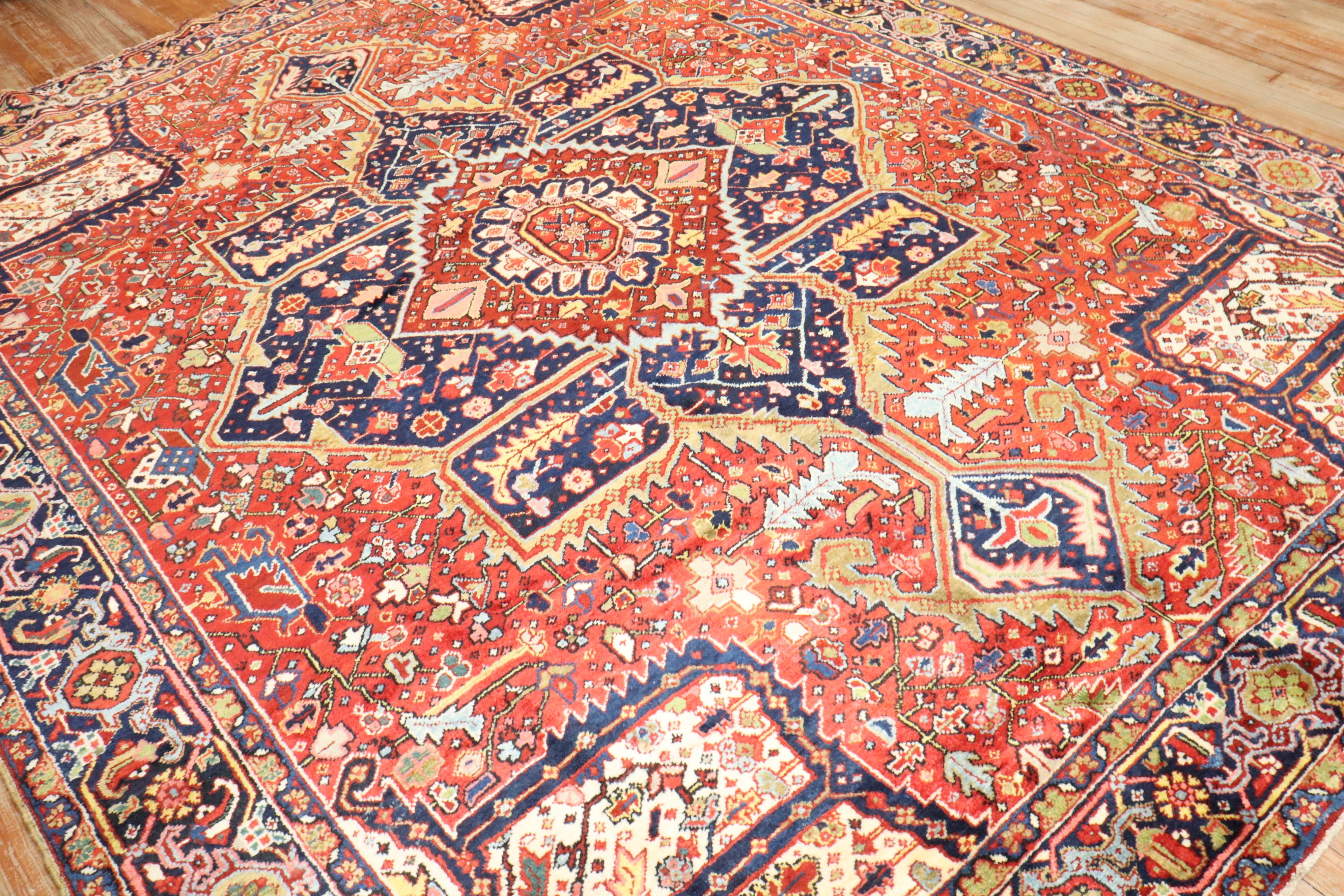 Wonderful high decorative antique-size Persian Heriz Rug from the 1st quarter of the 20th century

8'4'' x 10'9''

The finest antique Persian Heriz rugs are geometric in design with open spacious patterns invibrant colors. The great majority of them