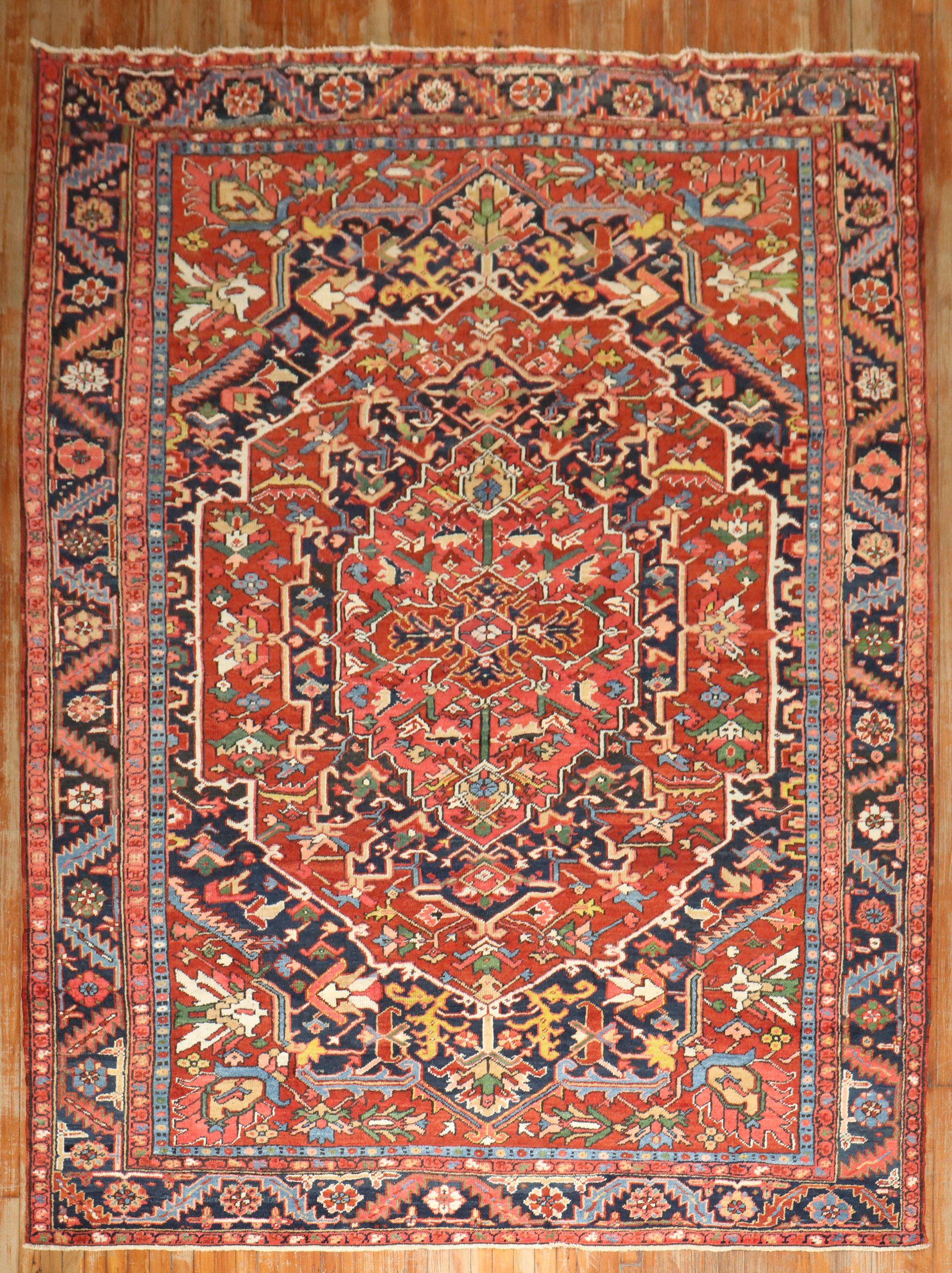 Wonderful high decorative antique Room size Persian Heriz Rug from the 1st quarter of the 20th century

8'1'' x 10'10''

The finest antique Persian Heriz rugs are geometric in design with open spacious patterns invibrant colors. The great majority