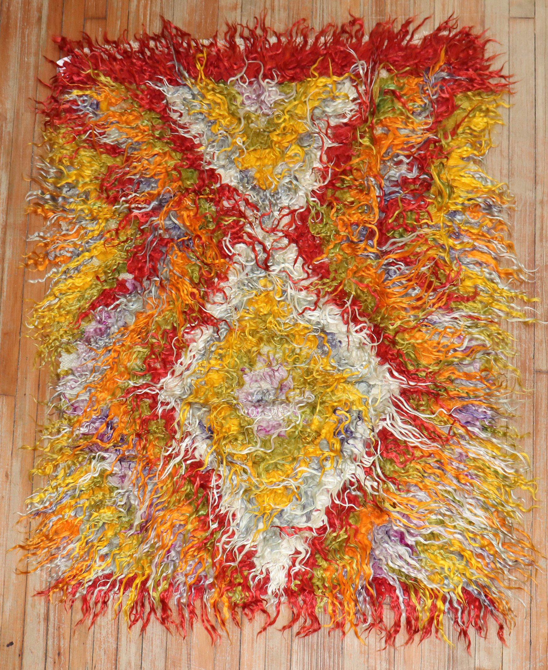 A 3rd quarter of the Century Turkish Tulu shag rug with bright funky colors.

3'5'' x 4'4''