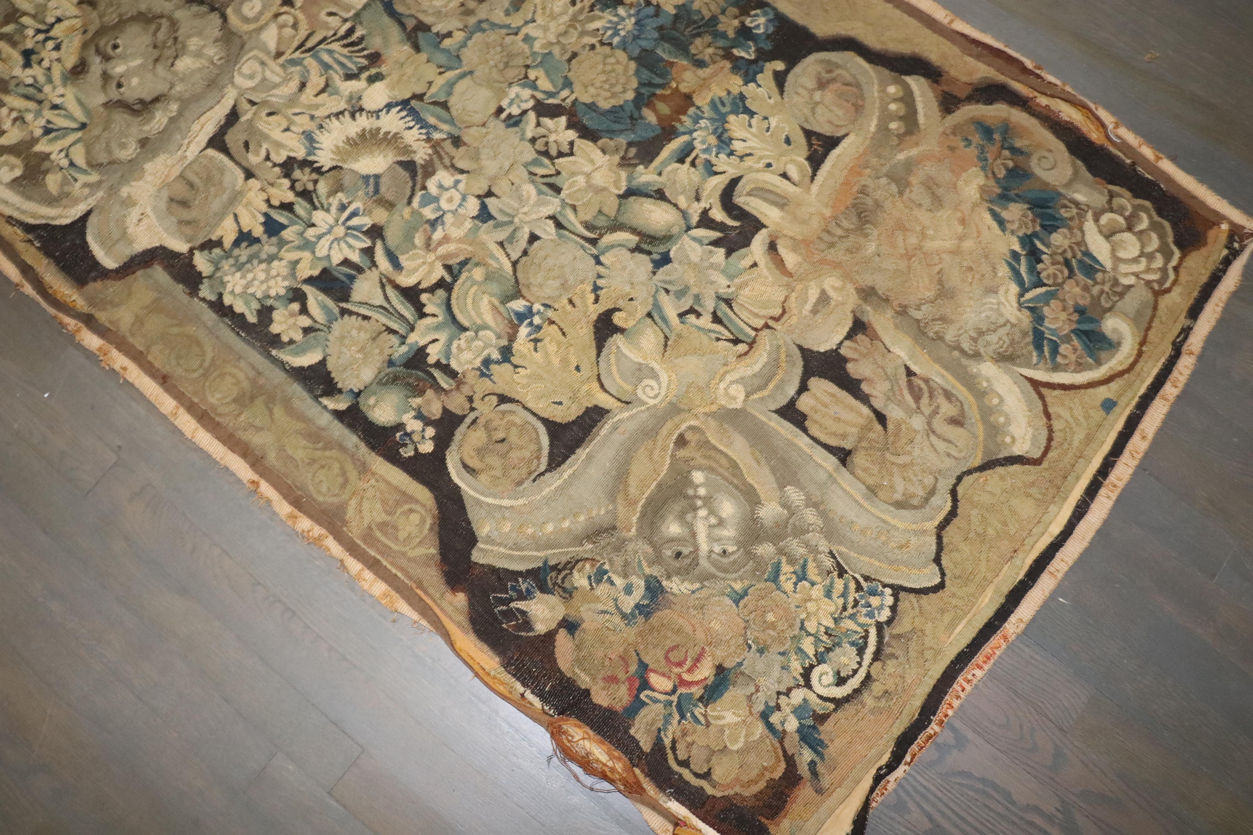 an 18th -century distressed Tapestry

Details
rug no.	10738
size	3' 1
