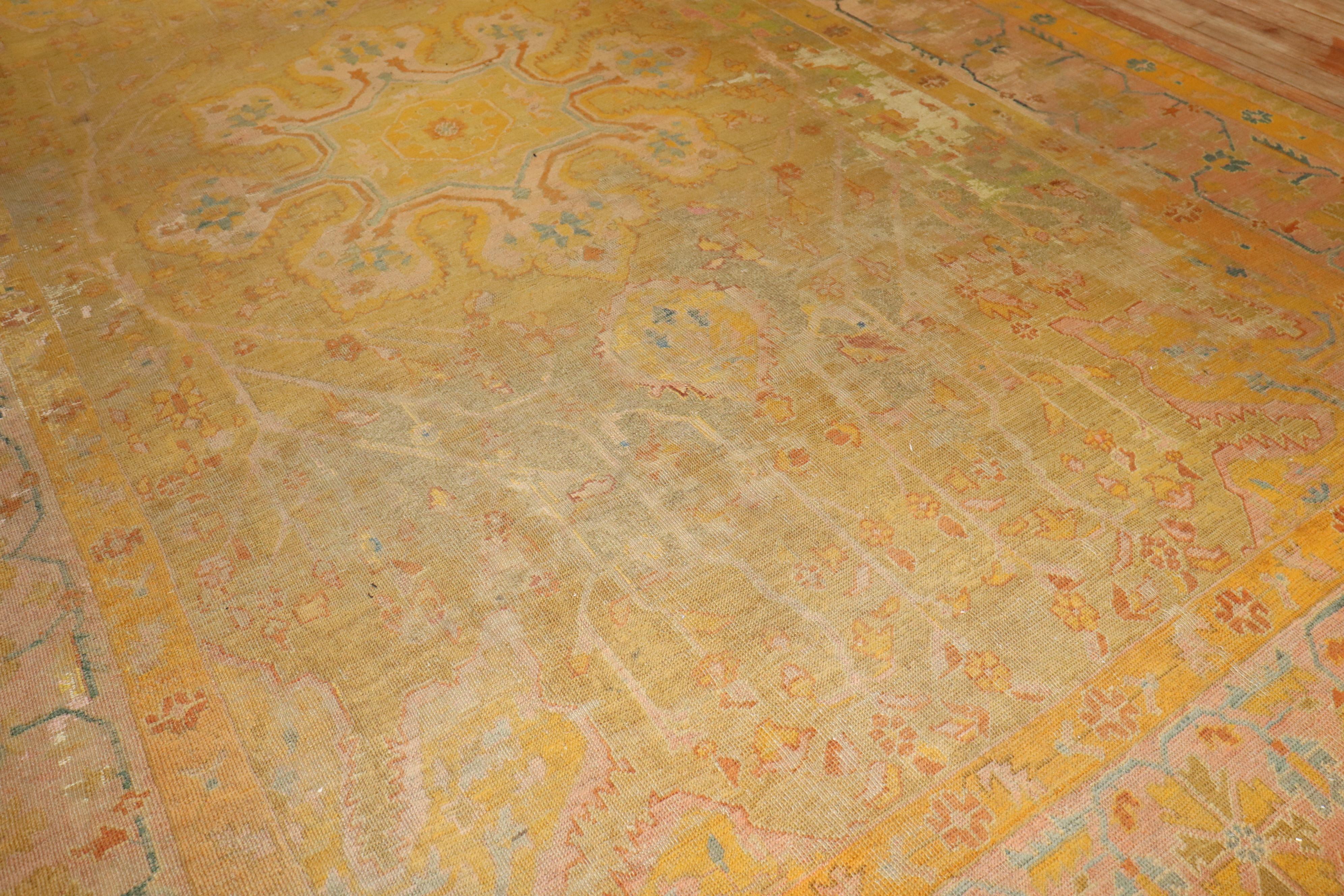 Wool Zabihi Collection Distressed Colorful Antique Turkish Oushak 19th Century Rug For Sale