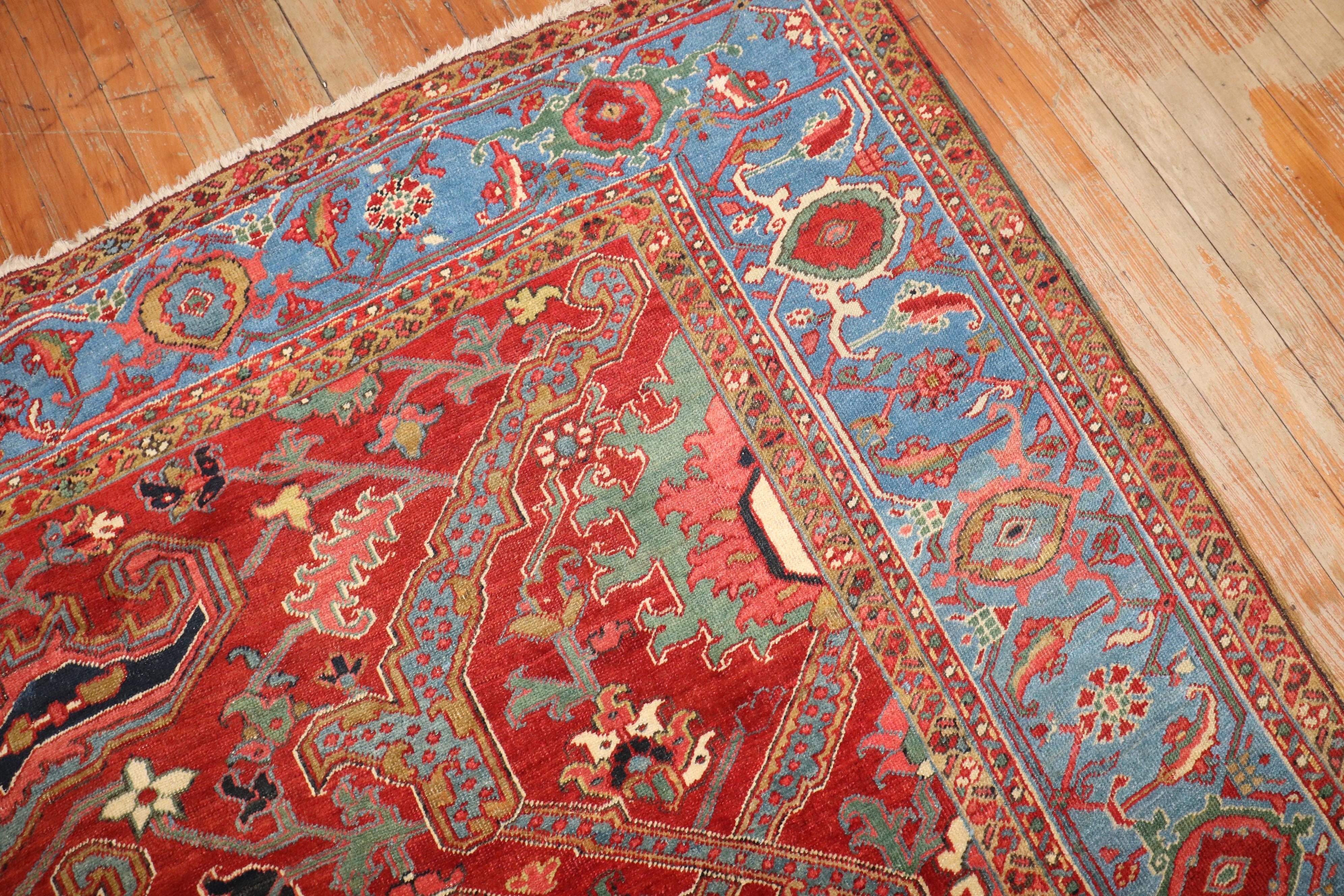 A stunning early 20th century Heriz Serapi rug with a large scale dragon style pattern on a rich red ground.

9' x 11'8''

Heriz rugs are Persian rugs from the area of Heris, East Azerbaijan in northwest Iran, northeast of Tabriz. Such rugs are