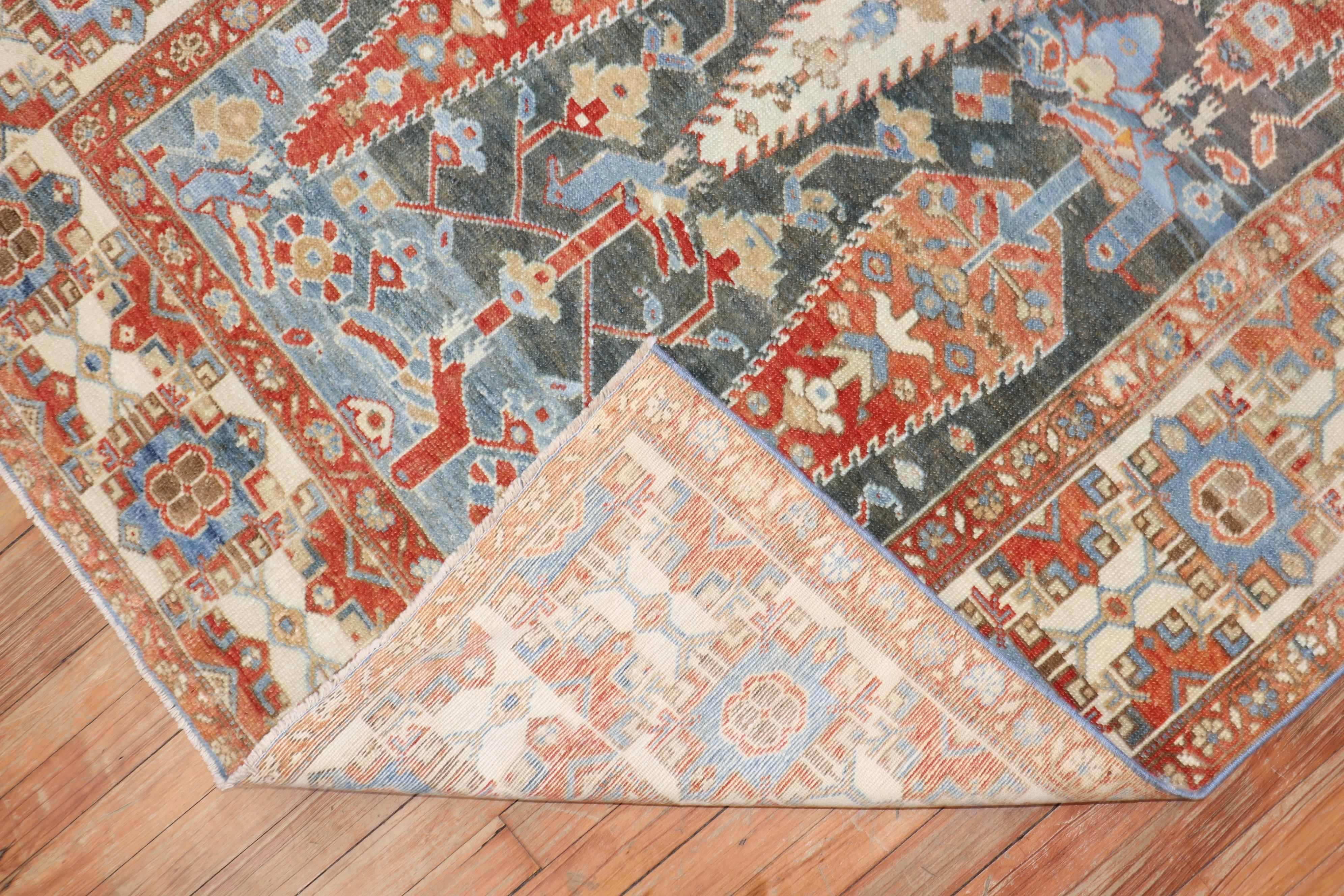 Zabihi Collection Dramatic Accent Size Antique Persian Bakhtiari Rug In Good Condition For Sale In New York, NY
