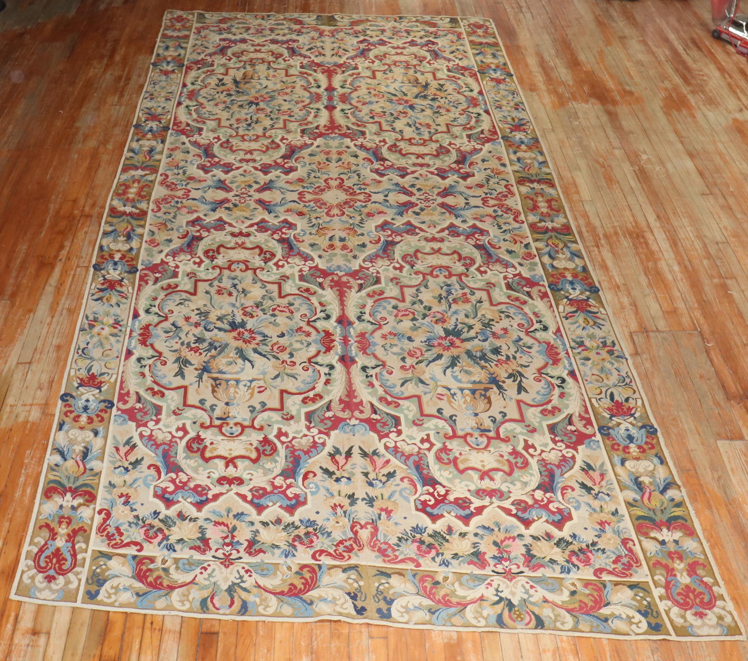 Dramatic mid 19th Century English Needlepoint ~ 

7'7'' x 16'3''


English needlepoint rugs, renowned for their profuse ﬂoral motifs, reached an artistic zenith in 1700-1750 but were produced through the end of the nineteenth century. Needlepoint
