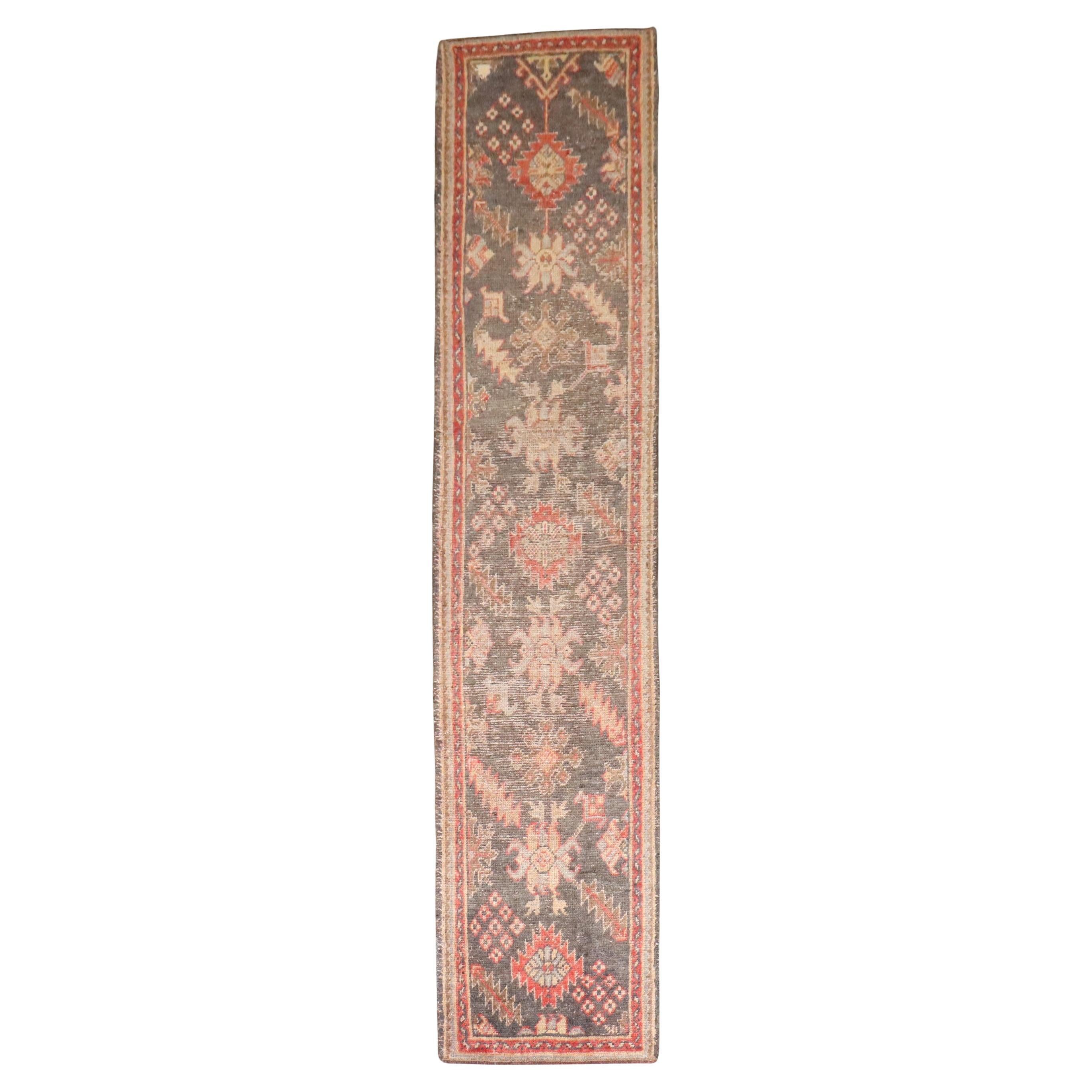 an early 20th Century Turkish Oushak Runner

Details
rug no.	j4284
size	2' 6